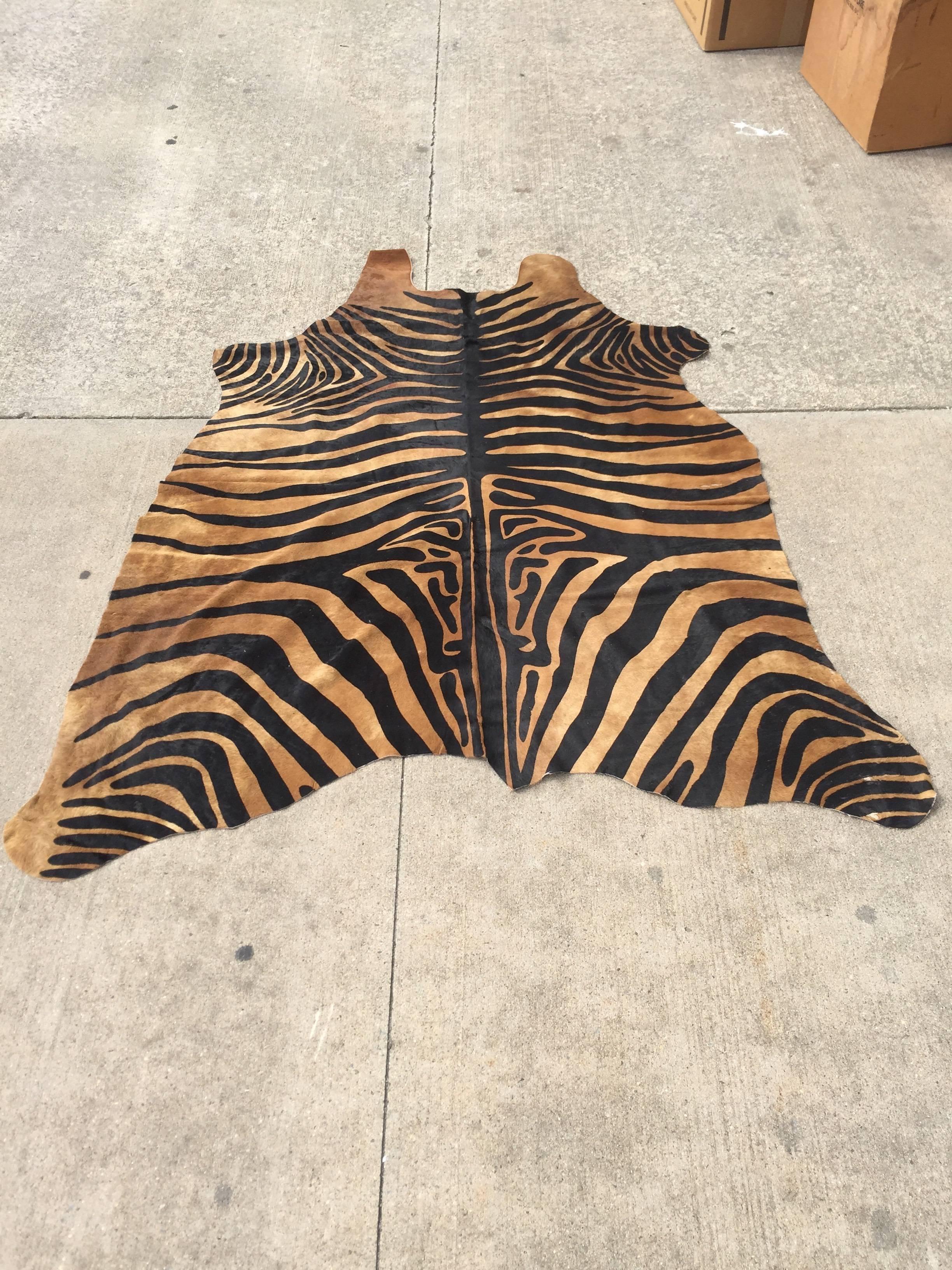 Beautiful carmel and sable stamped cowhide, great condition.