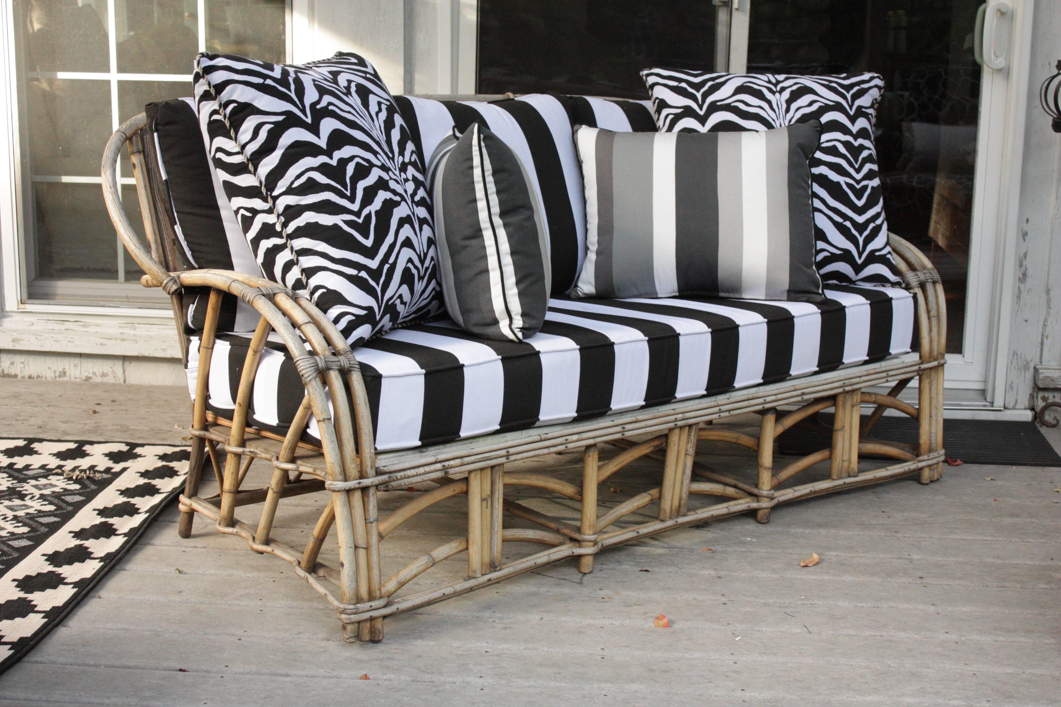 Vintage 1960s high life-inspired outdoor three seat bent bamboo skeleton framed sofa with curved back and arms. Bold Bengal striped fabric with super-fast drying foam cushions. Complete with all four supremely luxurious pillows. Extremely