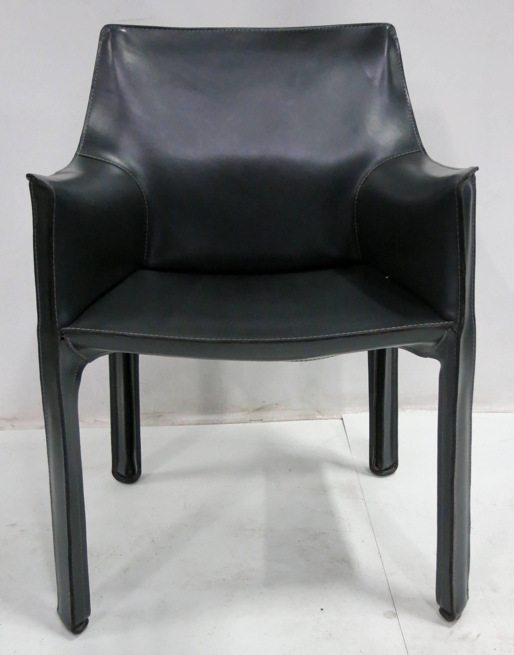 Set of four grey cab armchairs by Mario Bellini for Cassina. The set is in excellent condition.
