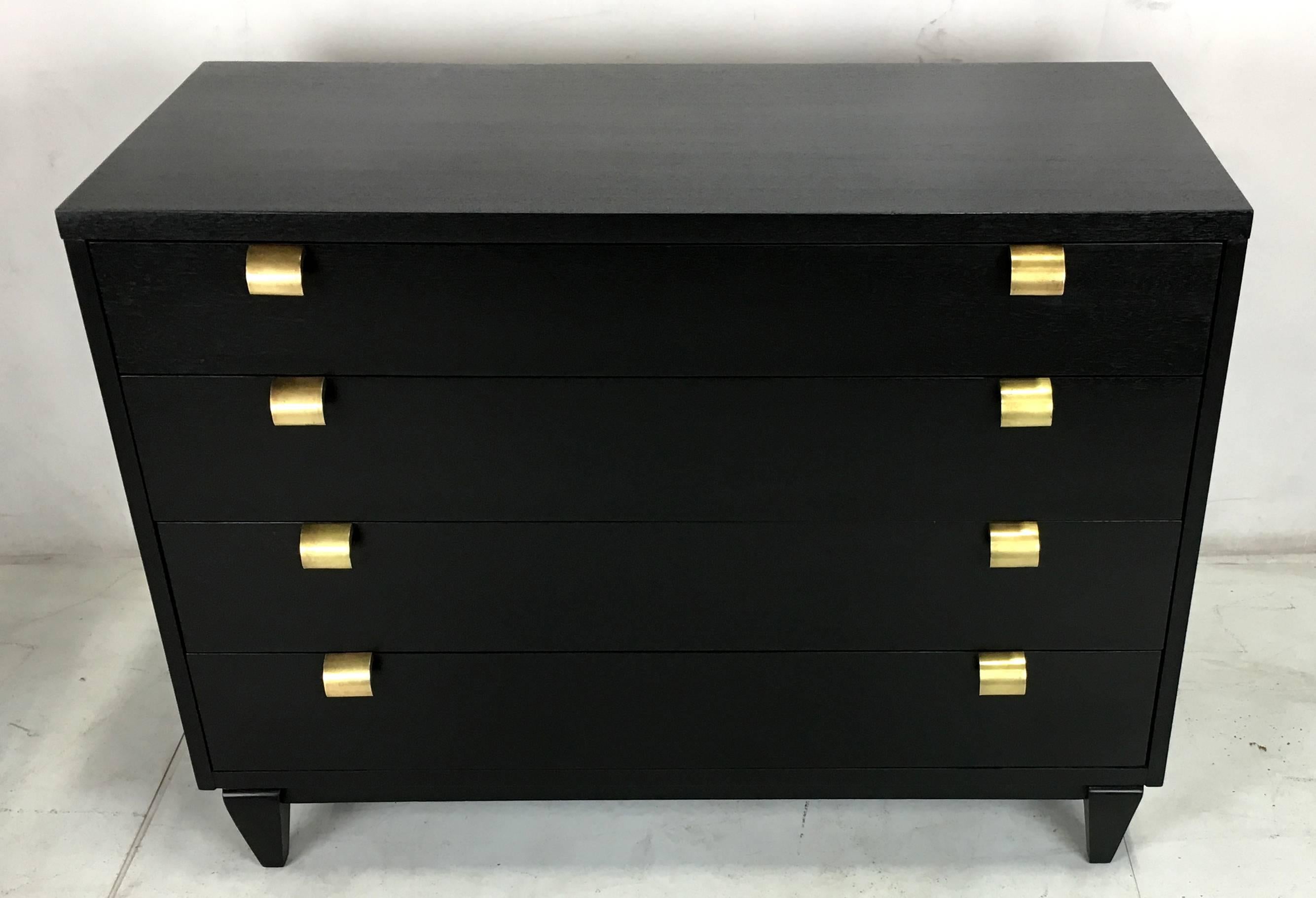 Handsome and large-scale bachelors chest by Merton Gershon for American of Martinsville meticulously refinished in open-grain ebony lacquer. The mahogany dresser can be used as a low chest or with the accessory Skyscraper style top piece, which