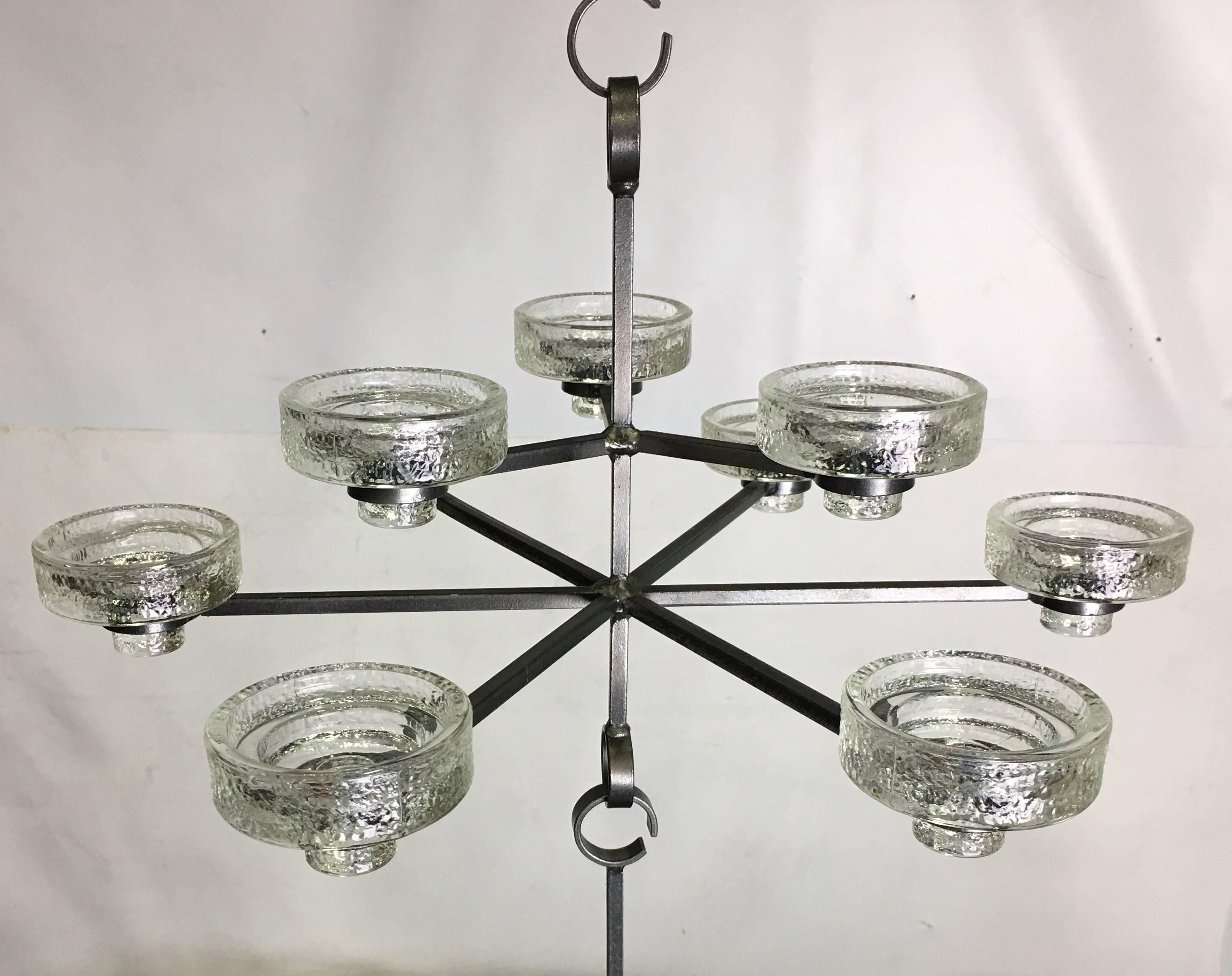 Rare and beautiful Nine-light chandelier by Erik Hoglund for Boda Nova. There are three 12" extensions.
