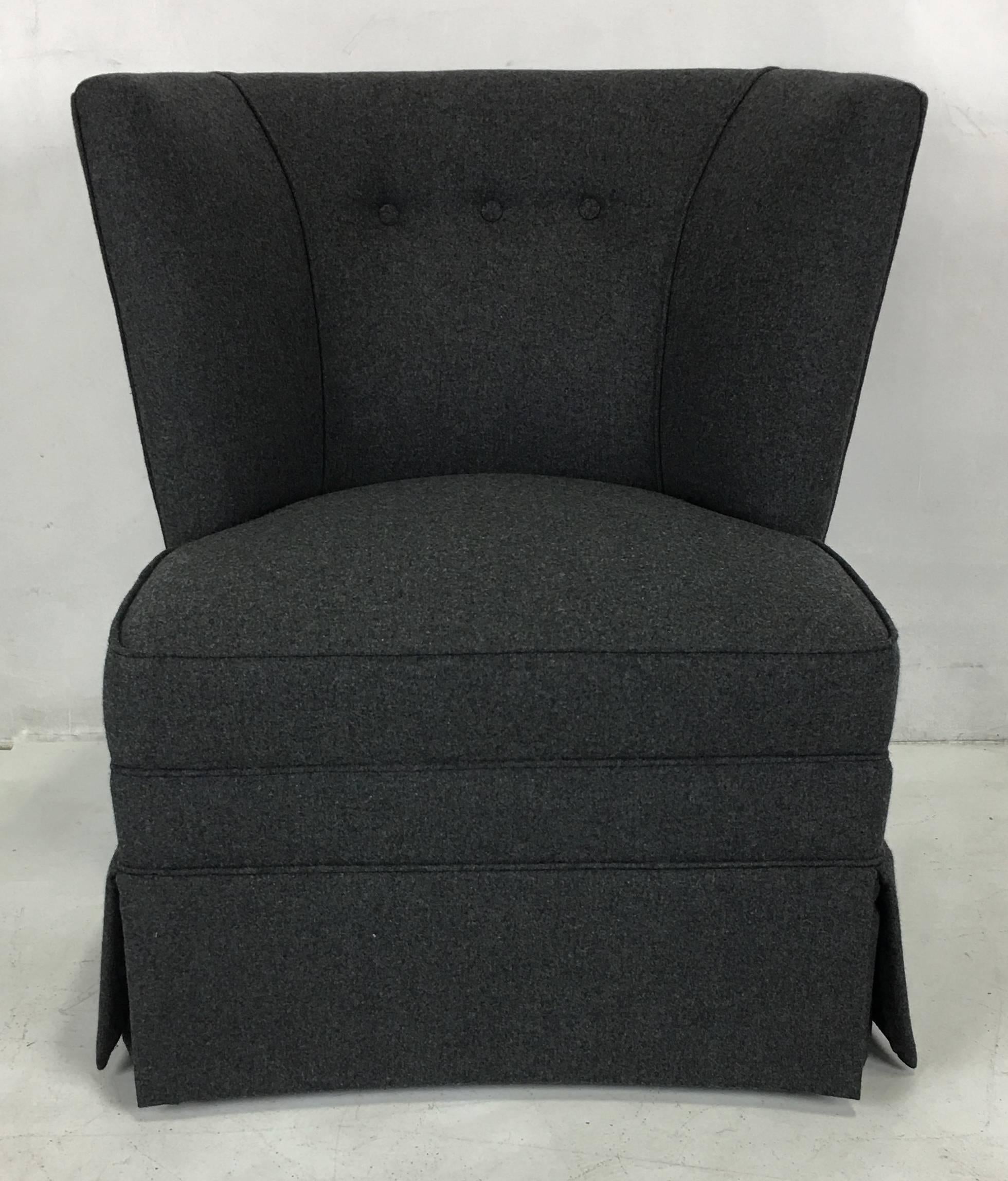 Beautiful small-scale wingback chair painstakingly restored and reupholstered in luxurious heavyweight charcoal grey Cashmere flannel. This would work spectacularly as a Gentleman's dressing room chair or occasional chair in a library or living