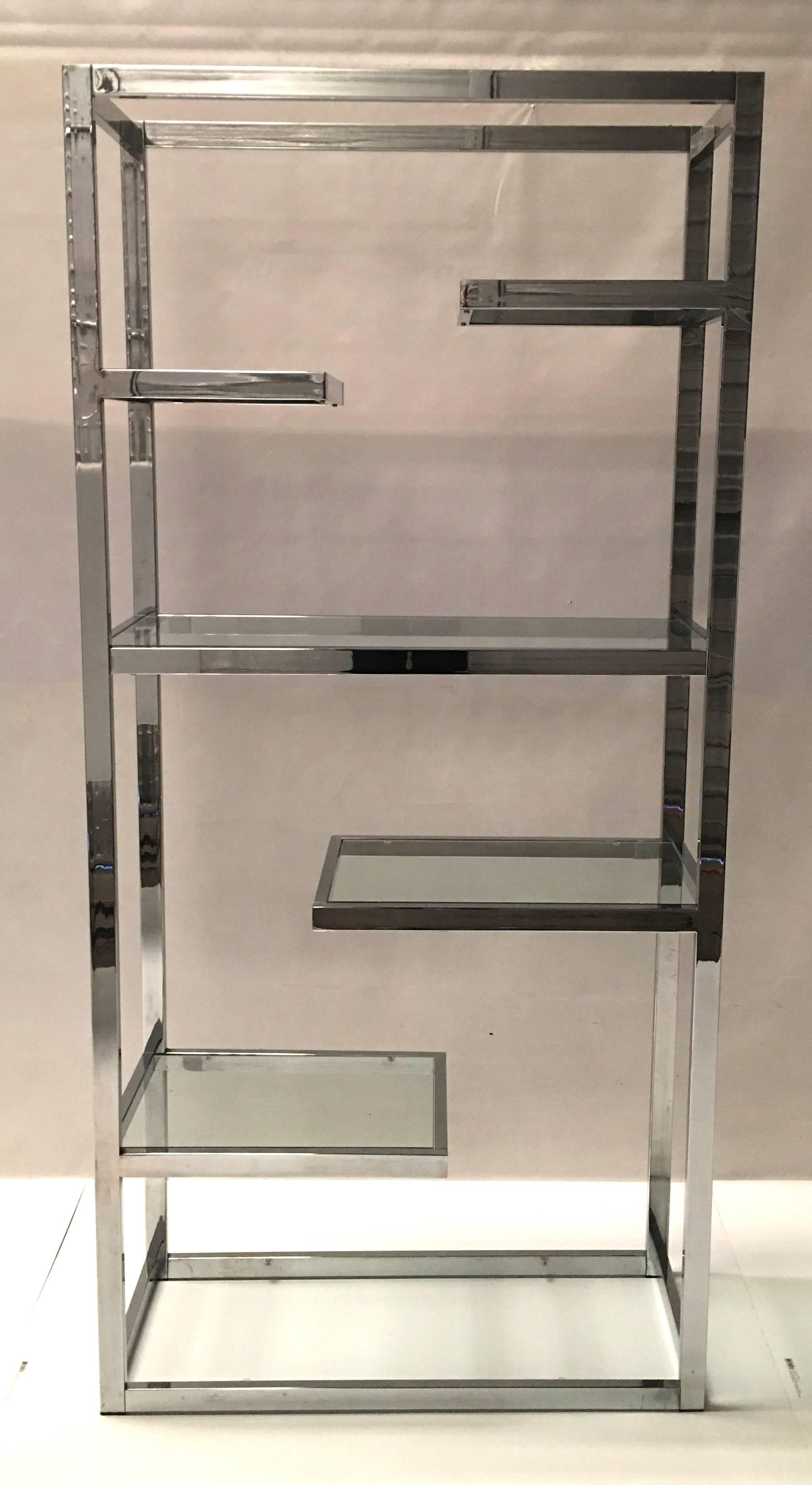 Straight from a modern time capsule interior comes this rarely seen Chrome Etagere by Milo Baughman for Thayer Coggin. Six random width shelves make this a true sculptural statement as well as a versatile storage shelf for books or objects. The