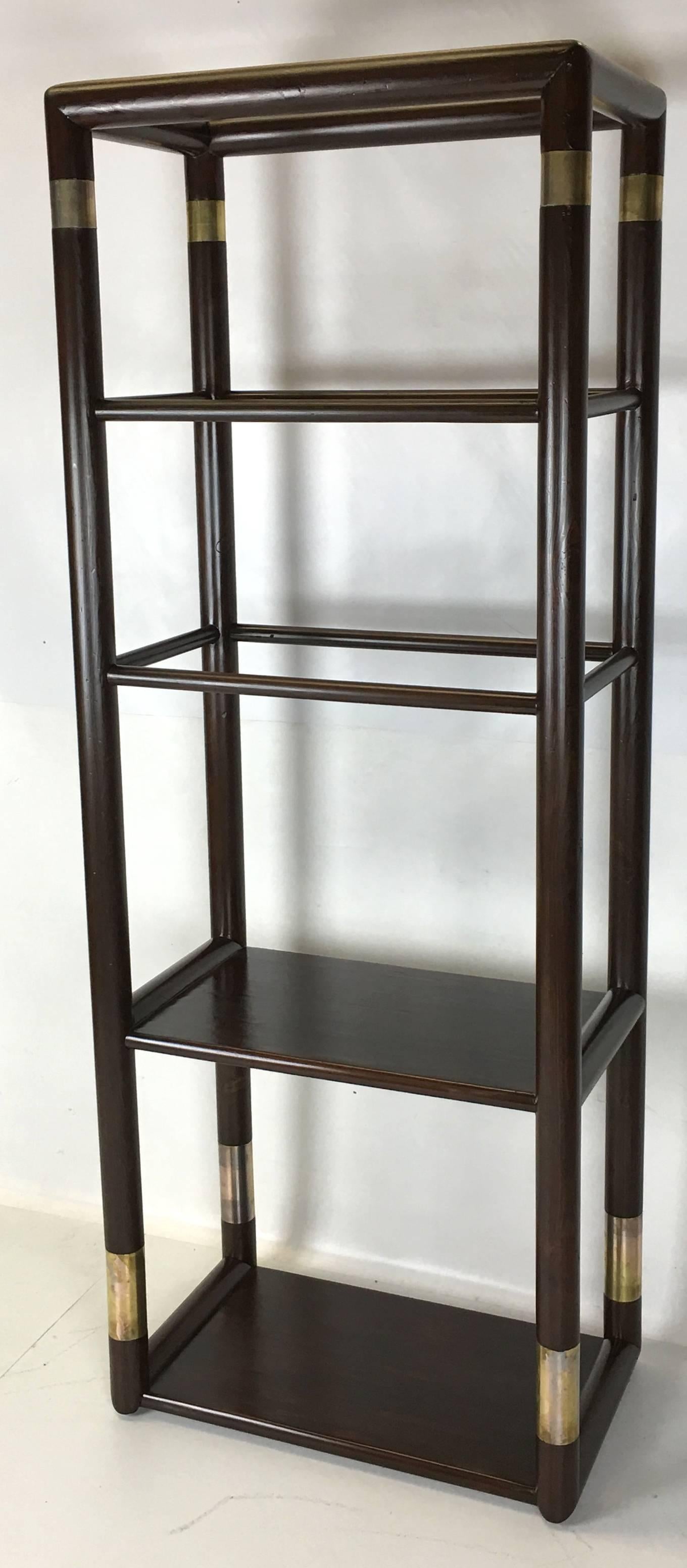 Pair of large-scale modernist Étagères with patinated steel cuffs. The pair is constructed of 3.5" diameter Fir dowel stock with the two lower shelves having a butcher block style construction. The remaining shelves are inset clear glass. They