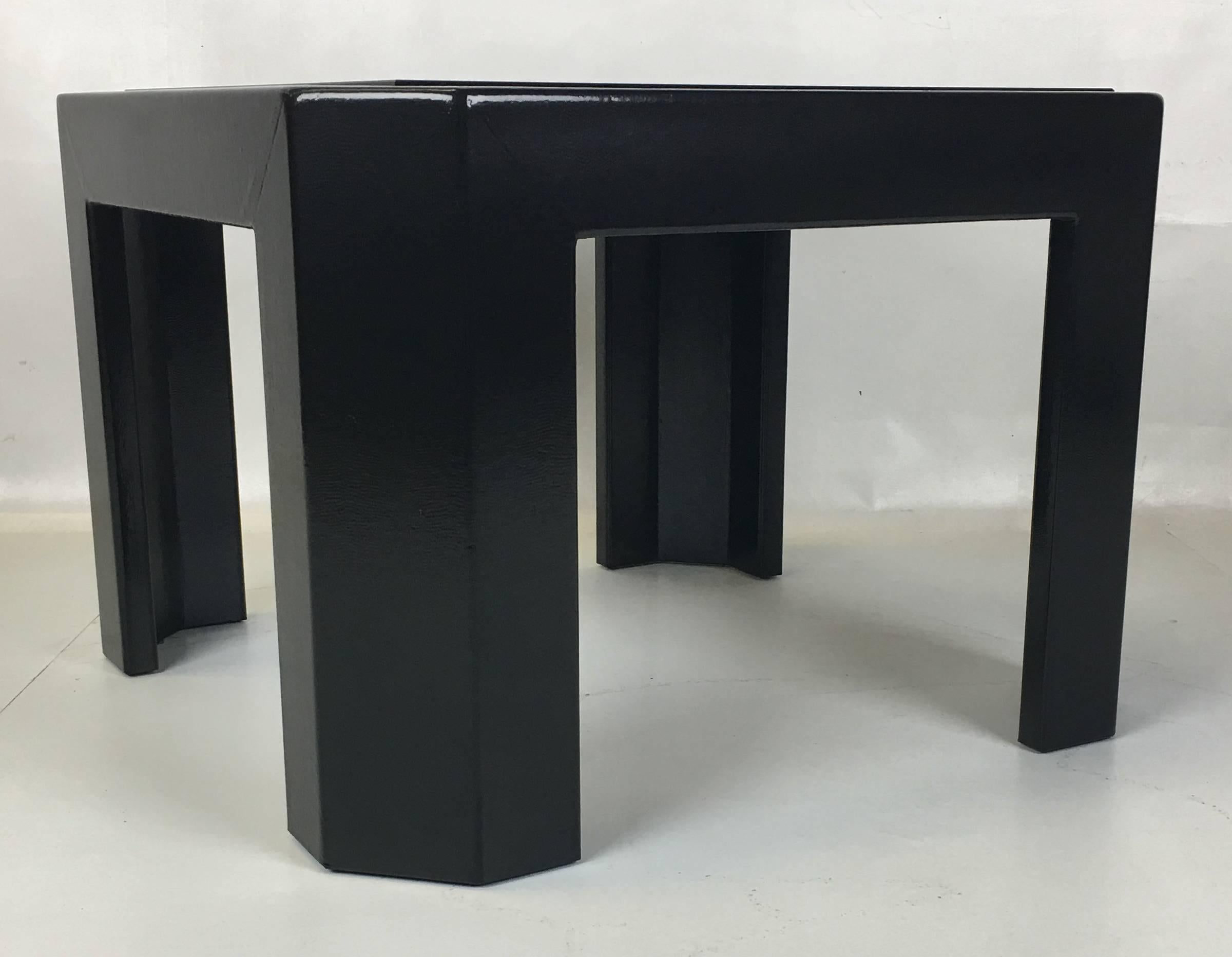 Beautifully crafted black lacquered snakeskin side table with cut corners and inset smoked glass by Ron Seff.