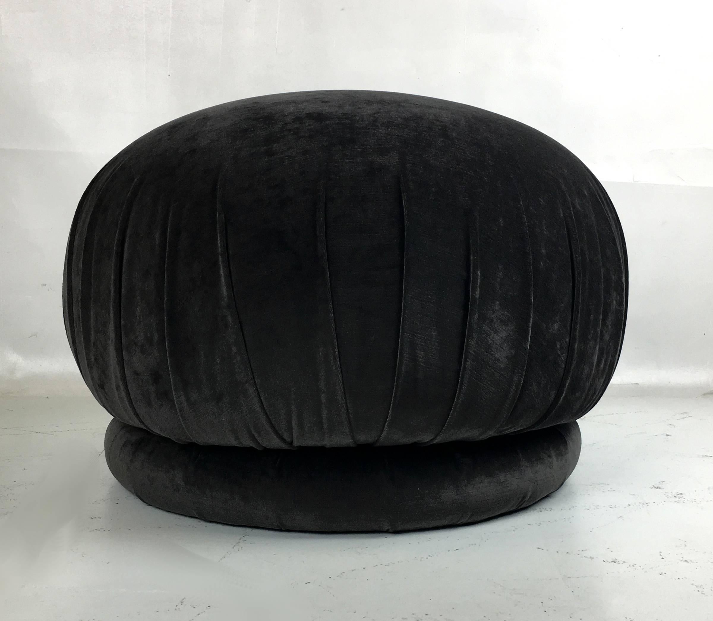 Pair of velvet poufs by Vladimir Kagan for Directional. These well-padded sculptural seats are just the thing for stylish pull-up occasional seating. Quality construction and design by Directional. Directional Furniture championed most of the great