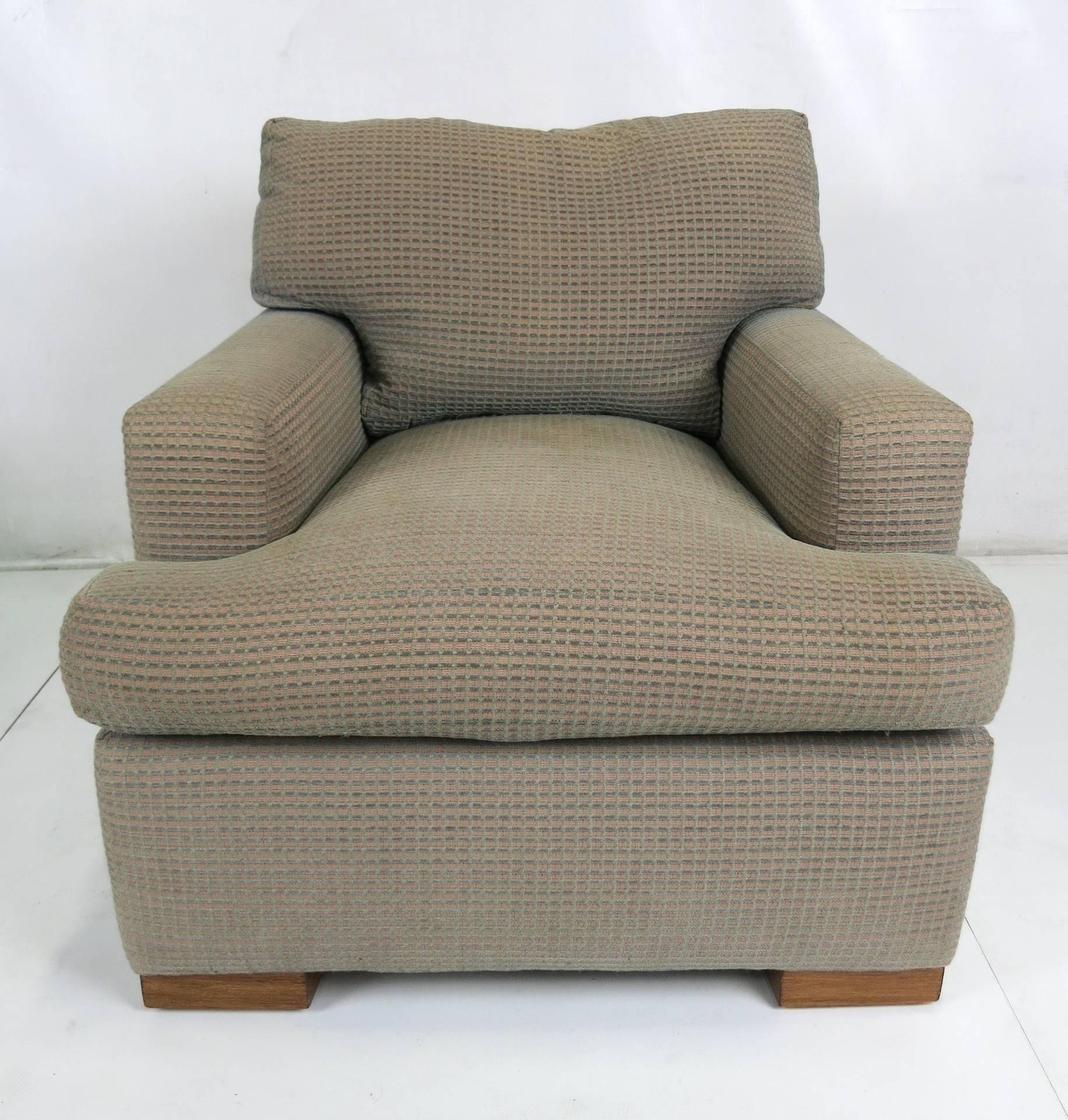 Handsome pair of classic Jean-Michel Frank style lounge chairs by the venerable A. Rudin Company. The chairs feature feather/down cushions. Model number 491 