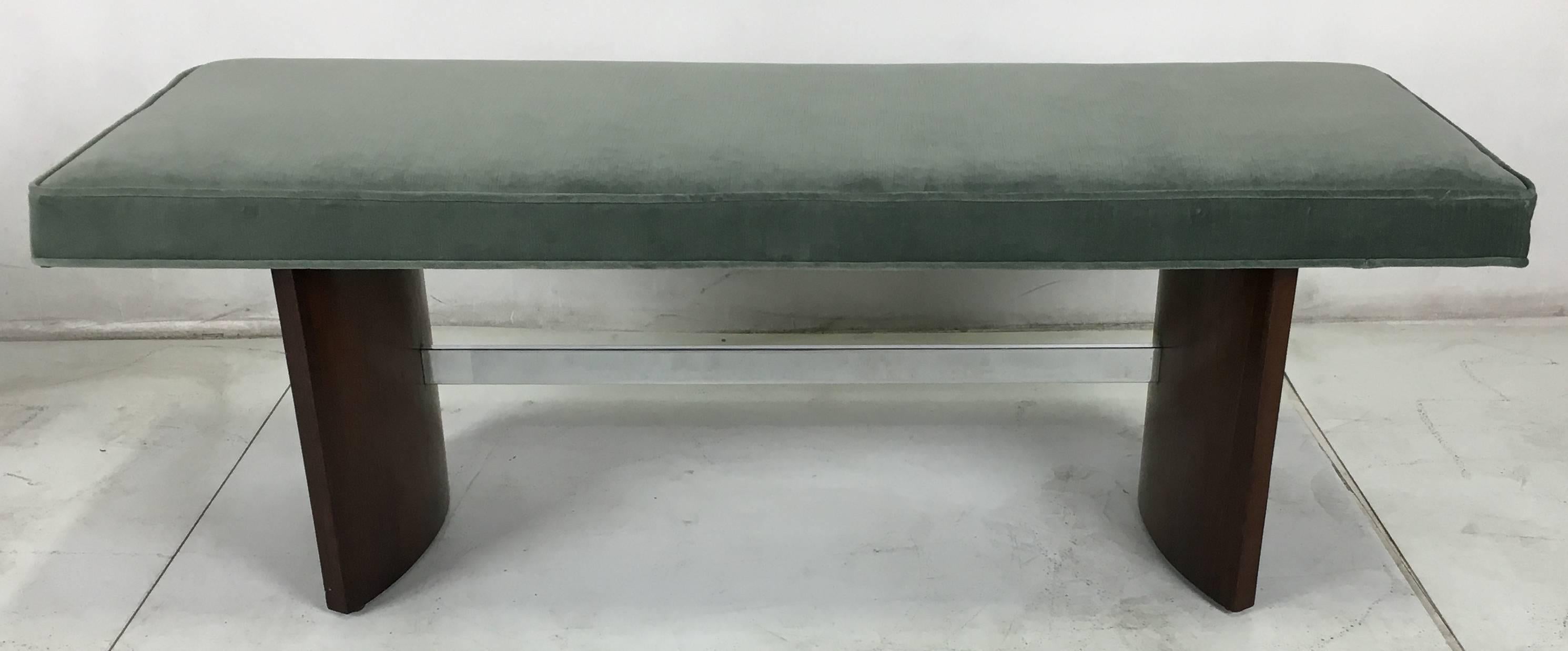 Velvet upholstered seat raised on a pair of Radius supports with a chrome stretcher by Vladimir Kagan.