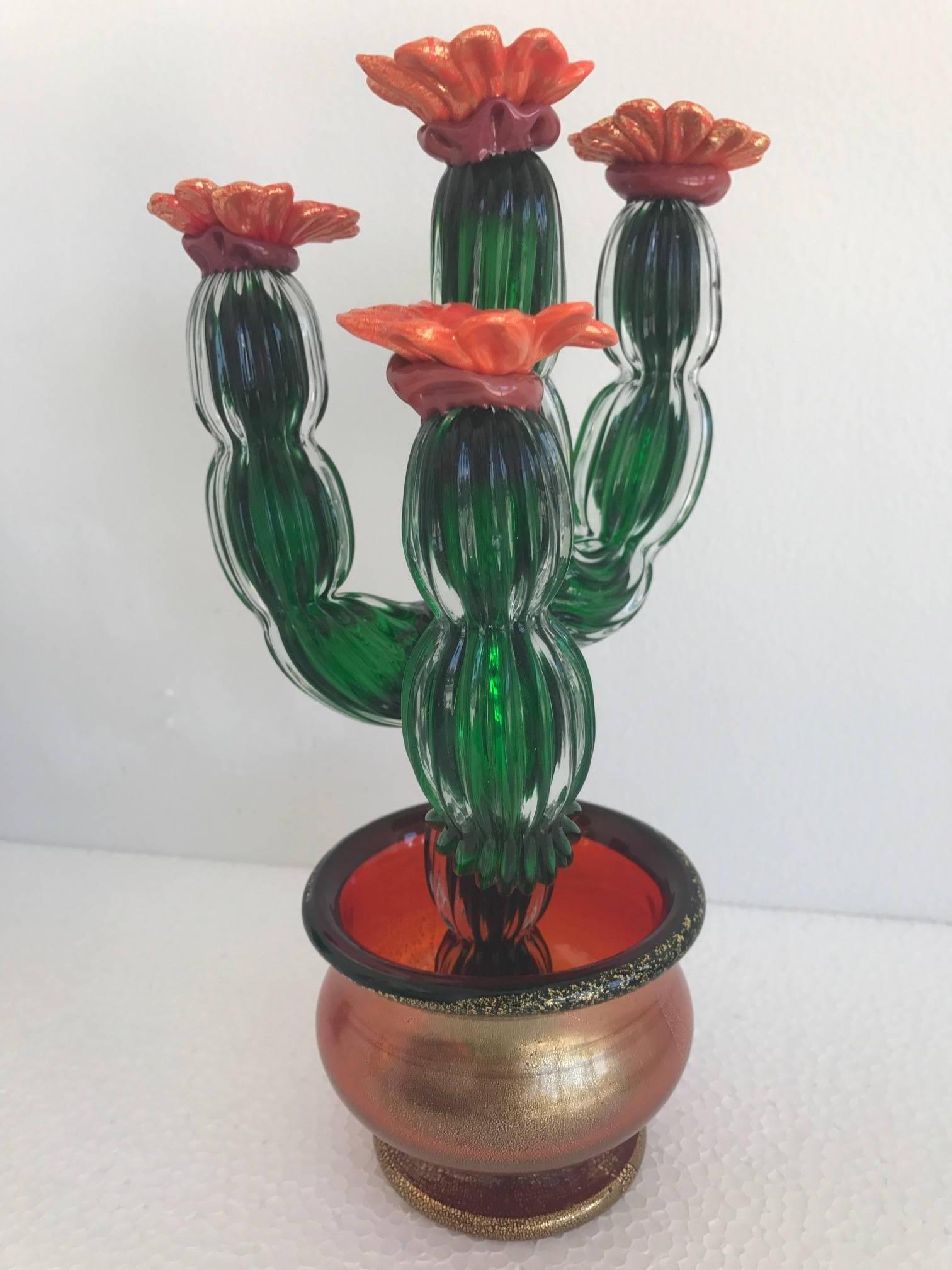 Two (almost a pair) exceptional 1980s Murano blown green and red glass cacti in pots. Please see our listings for more cacti to add or start your own collection.
For additional questions regarding this item, please click the "Contact