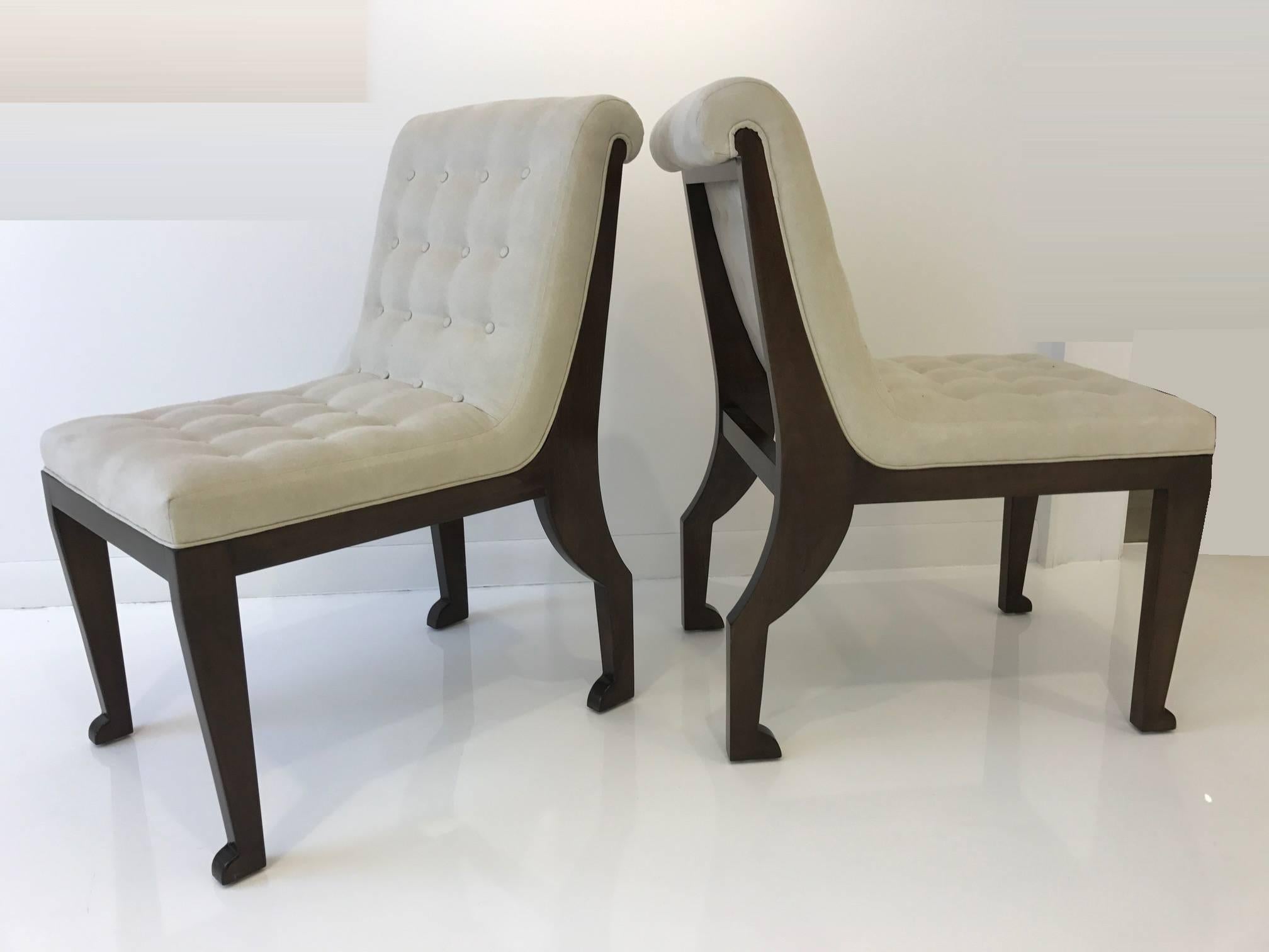 French modern Neoclassical style slipper chairs in the manner of  Marc du Plantier, circa 1980. Newly upholstered with suede, dark stained mahogany.
FREE SHIPPING: White Glove to Continental US.