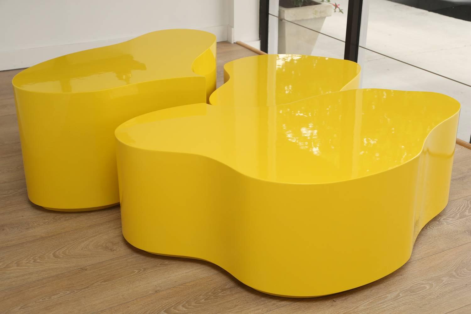 A vintage set of free-form coffee tables, newly lacquered in canary yellow.
Additional tables measurements:
38.5 x 23.5 D x 18.25 H inches
33.5 x 23 D x 12.5 H inches.
 