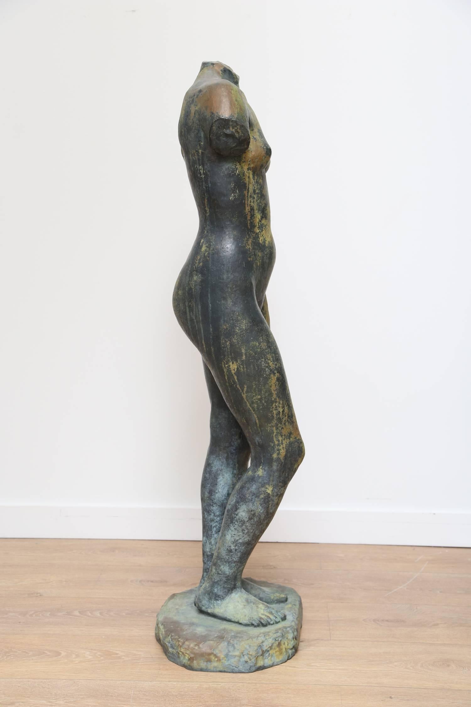 Classical style lifesize nude bronze sculpture by Georges Coulon (FRENCH, 1914-1990). Signed and numbered 8/8, stamped by Deroyaume Foundry. Provenance available. 
Cement base available H.30 1/2