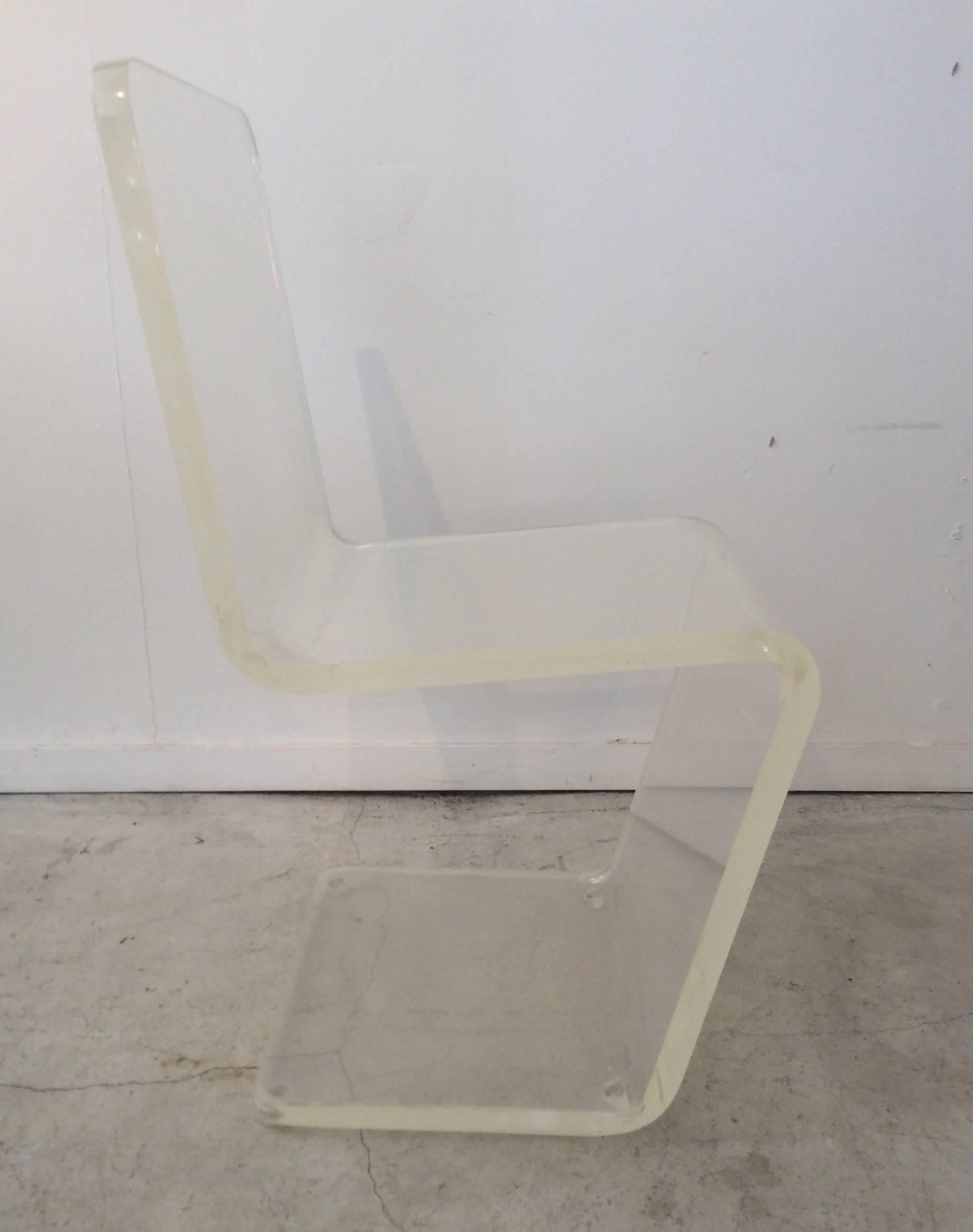 You are looking at a great Mid-Century Modern Lucite chair. Made of 1