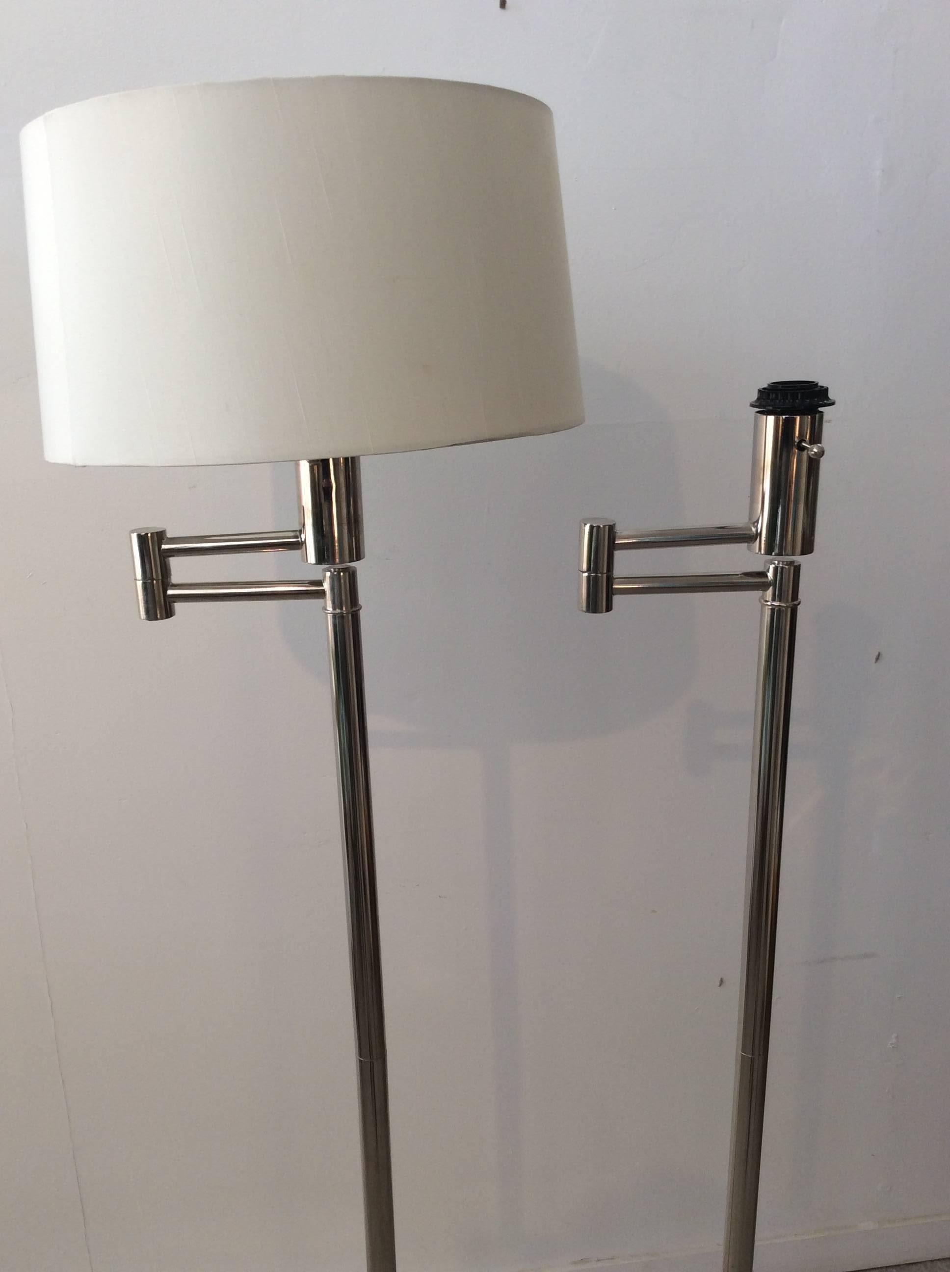 You are looking at a pair of Ralph Lauren swing arm chrome floor lamps. These lamps are newer. Don't know when they were manufactured but the style is definitely Mid-Century Modern. The chrome is in good shape with light wear. The electrical is in