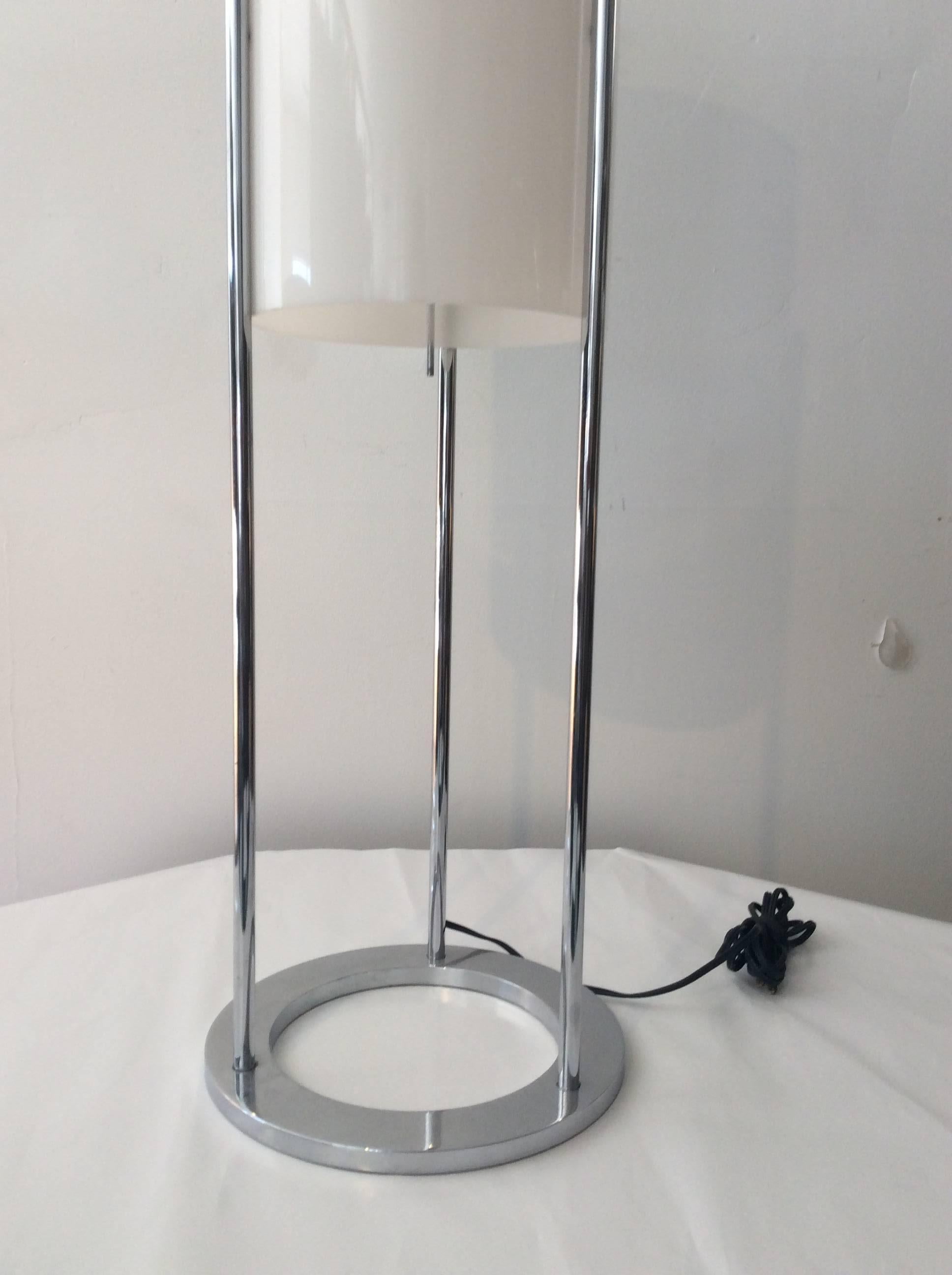 You are looking at a very modern lamp designed by Paul Mayen for Habitat . It is constructed of metal with a chrome-plated fin. The diffuser is made of white acrylic. Lamp has a cylindrical design. The on/ off pull chain is also chrome fin. The