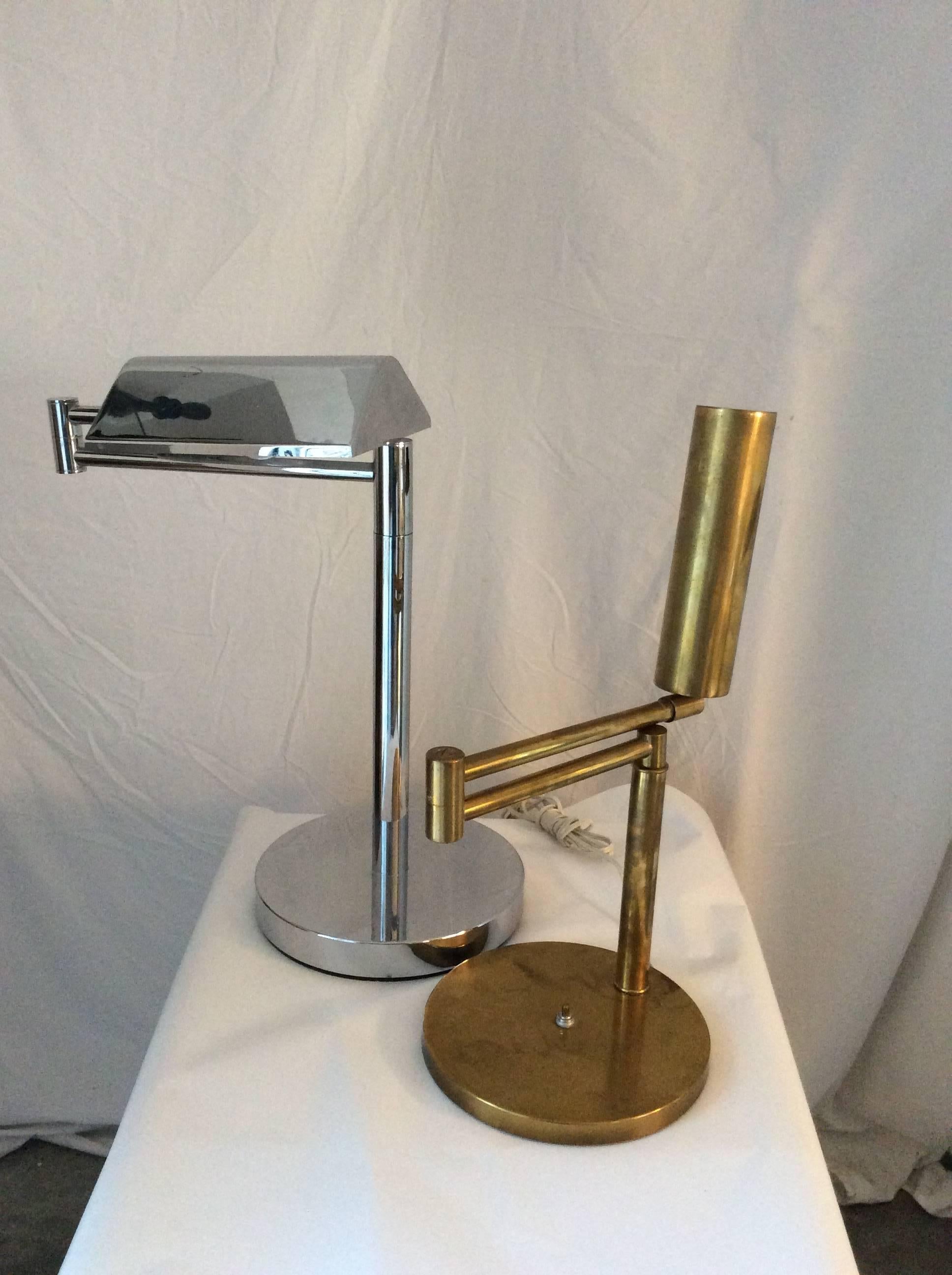 You are looking at two high quality table or desk lamps very much in the style of Koch & Lowy but neither are signed. These lamps both have a swing arm design and adjustable lighting housing in addition the brass lamp could be adjusted in