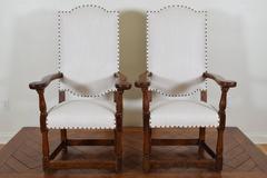 Pair of French Renaissance Style Elmwood Caquetoire Fauteuils, Mid-19th Century