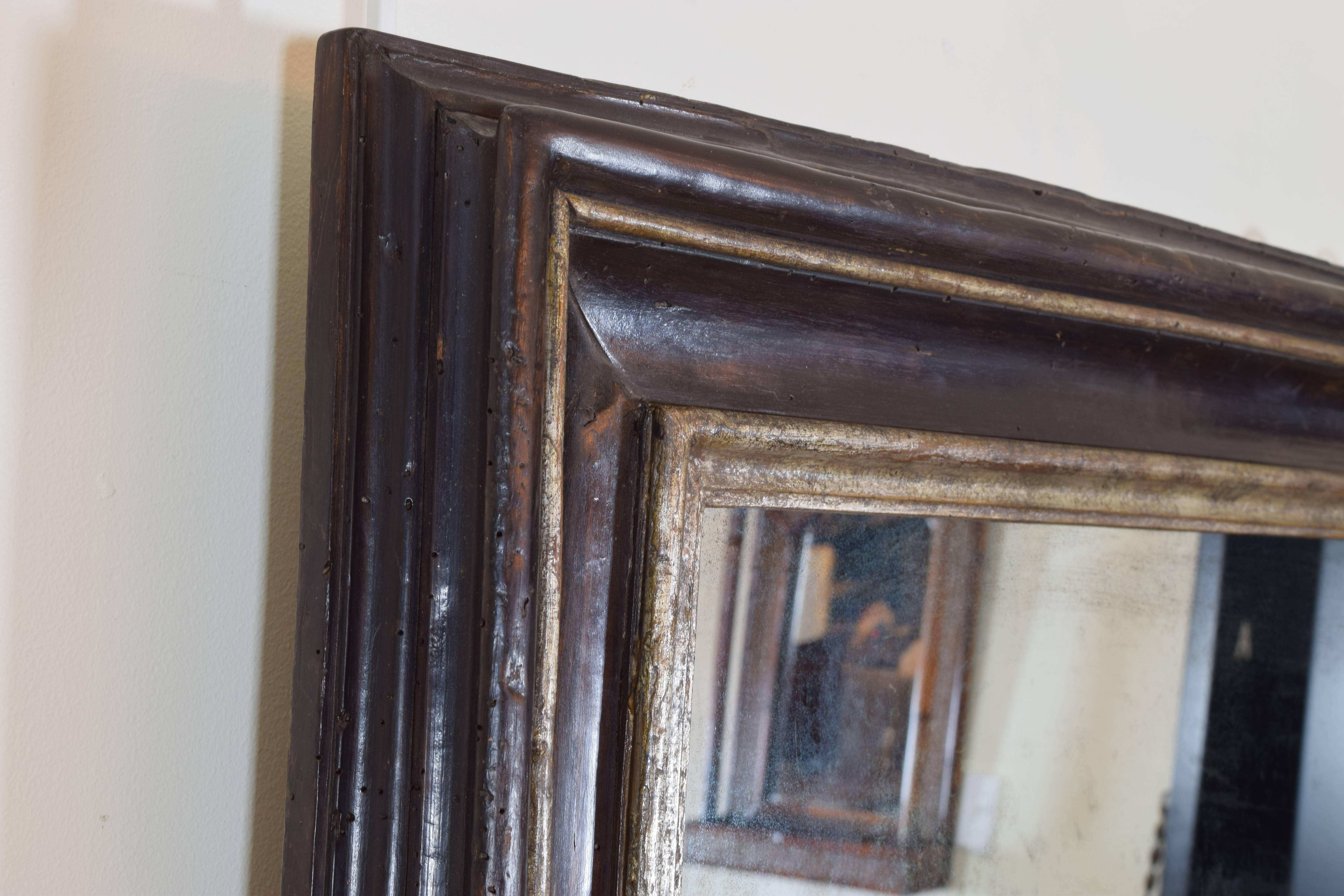Italian Baroque Ebonized Walnut and Silver Gilt Frame with Four-Piece Mirror In Excellent Condition In Atlanta, GA