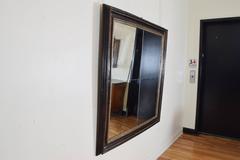 Italian Baroque Ebonized Walnut and Silver Gilt Frame with Four-Piece Mirror