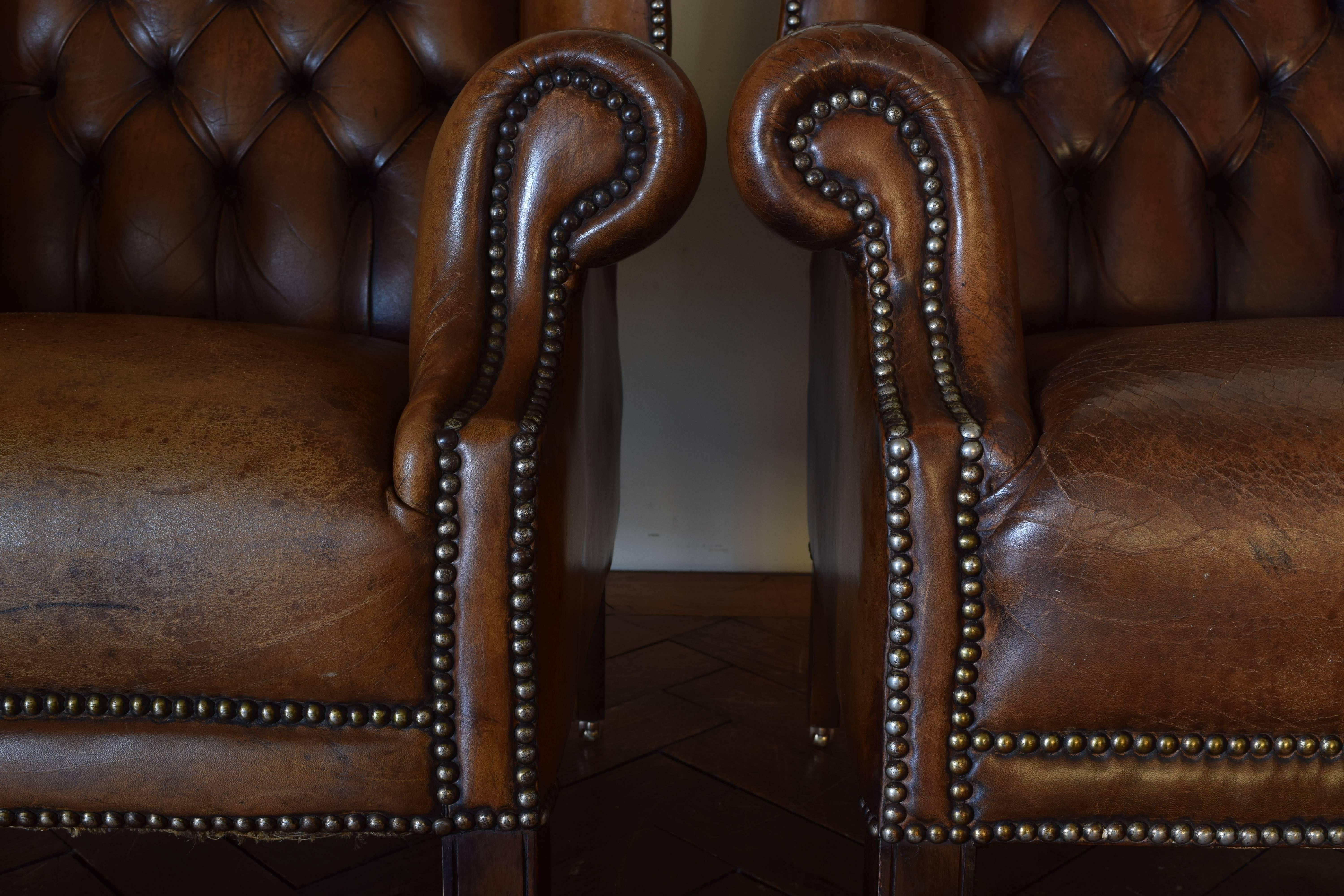 Pair of English George III Style Tufted Leather Wing Chairs In Good Condition In Atlanta, GA