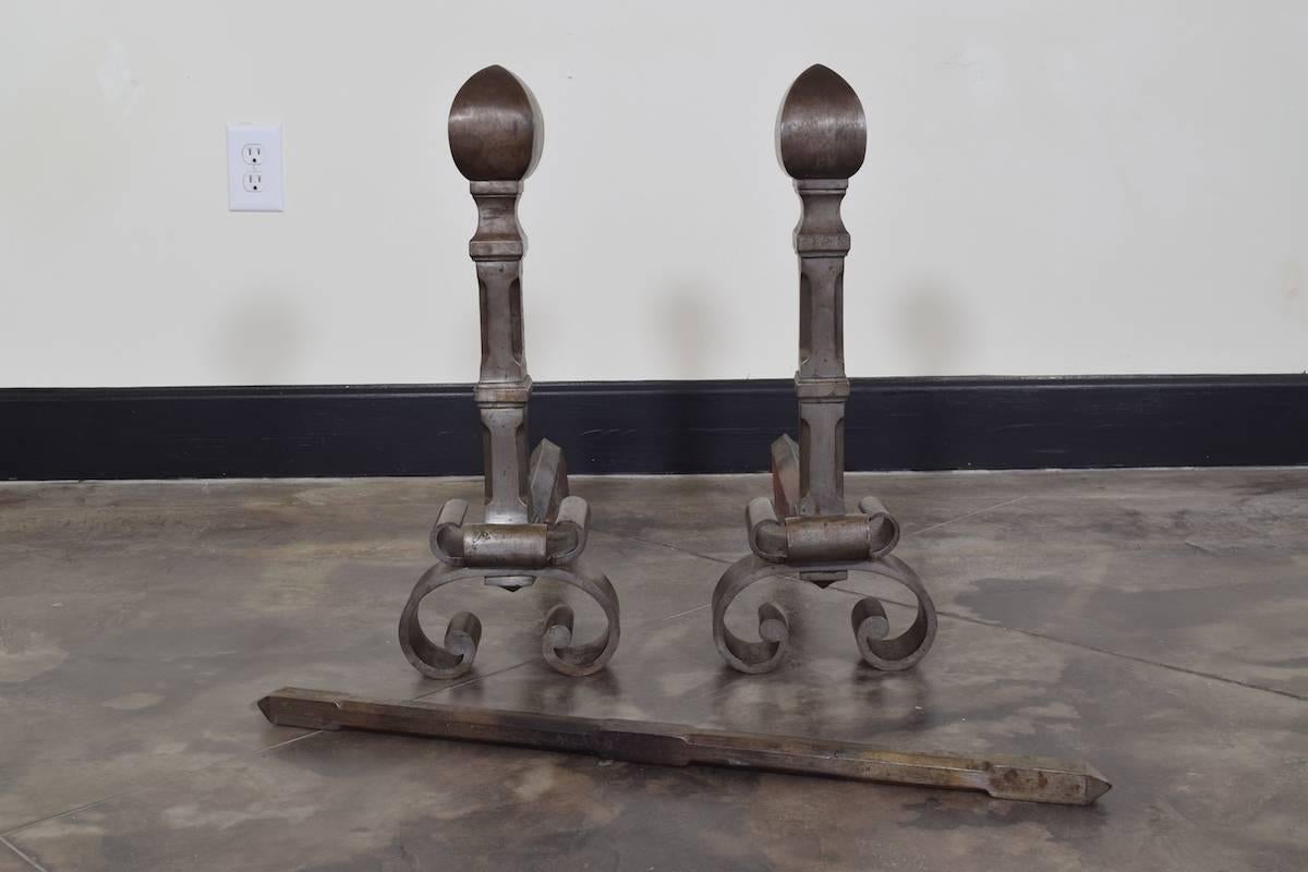 Early 19th century French steel andirons with fire tool.