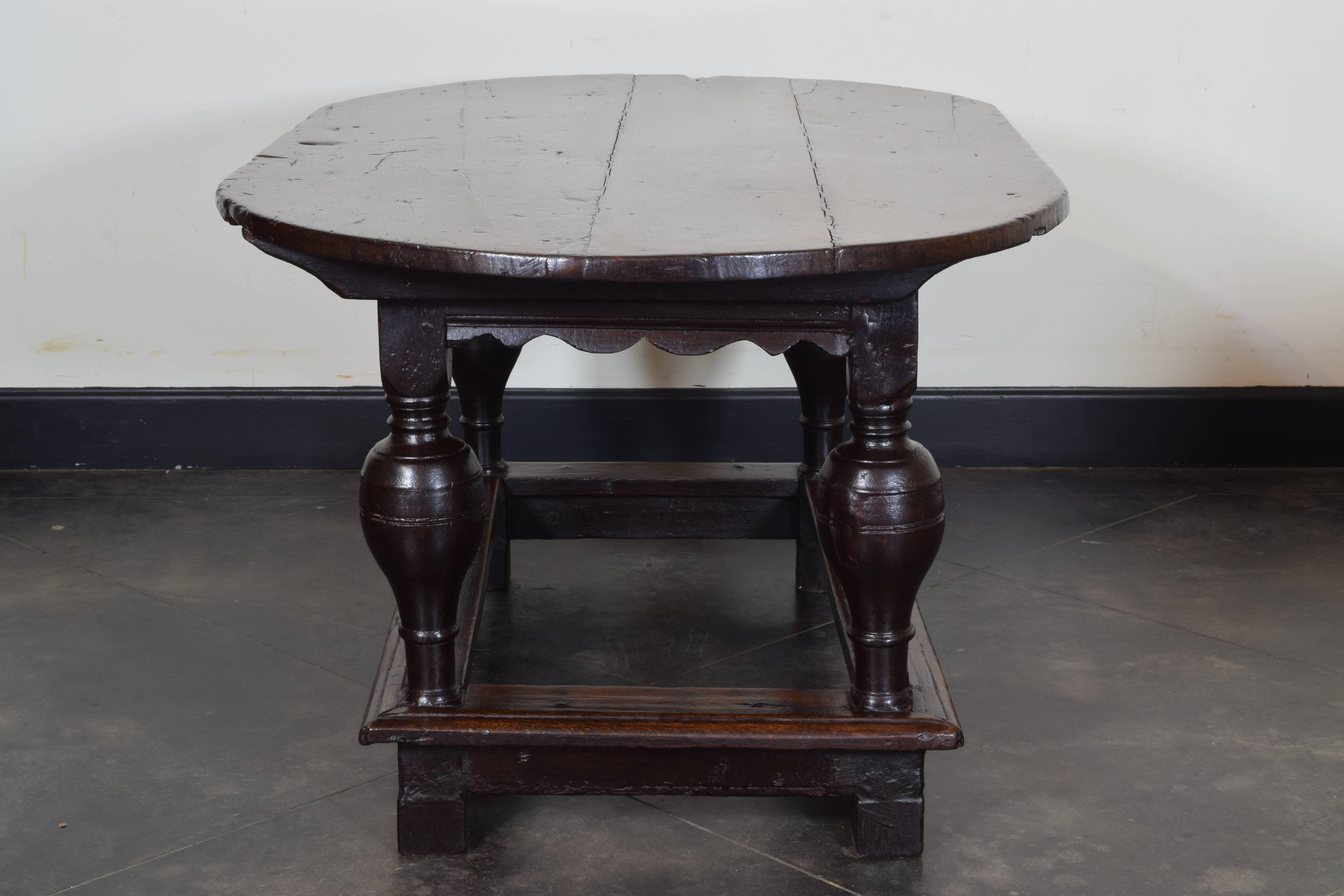 Baroque Flemish Carved Turned and Shaped Dark Oak Oval Table, Early 17th Century