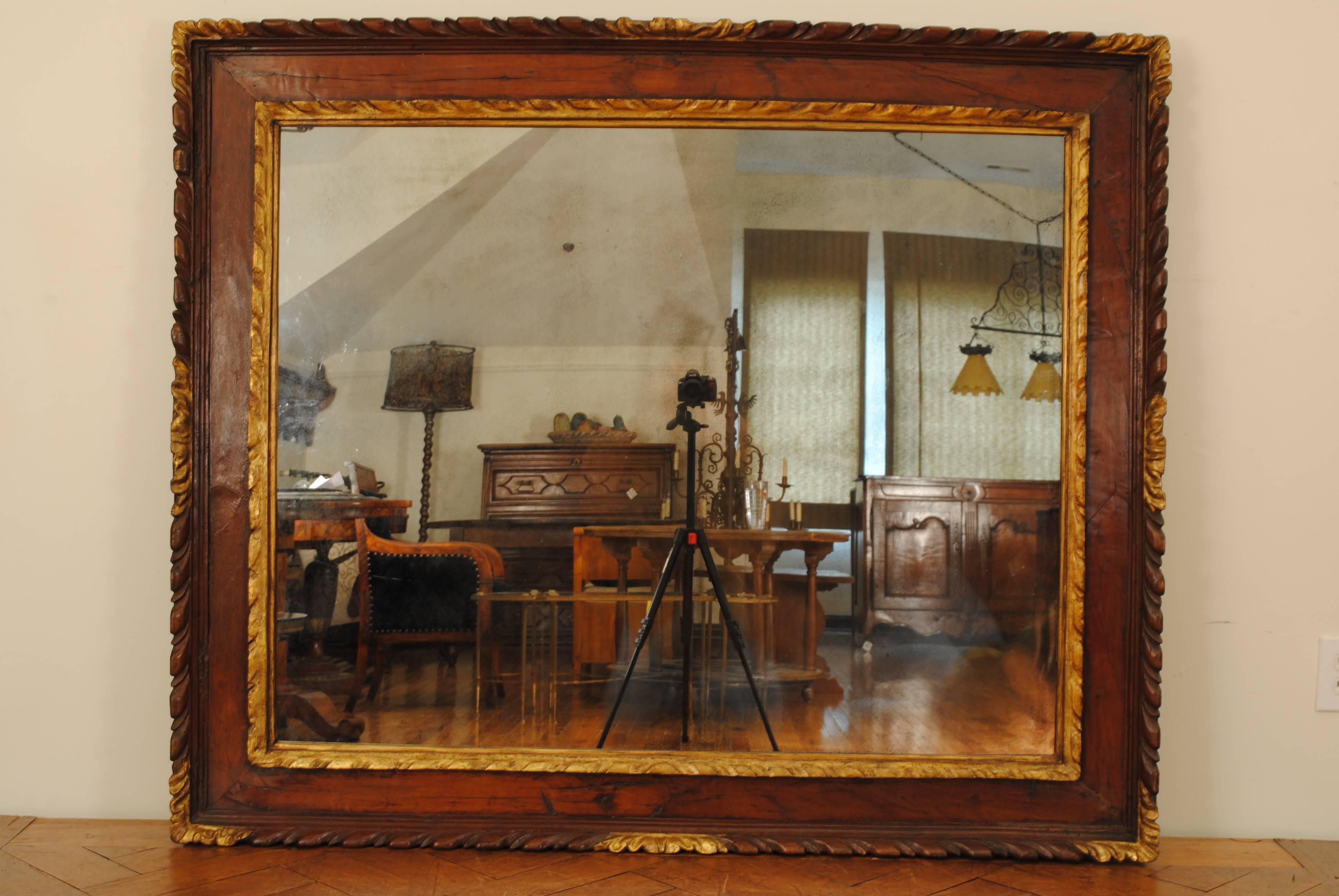 Louis XIII Italian, Piemonte, Carved and Veneered Mirror in a  Walnut and Giltwood Frame