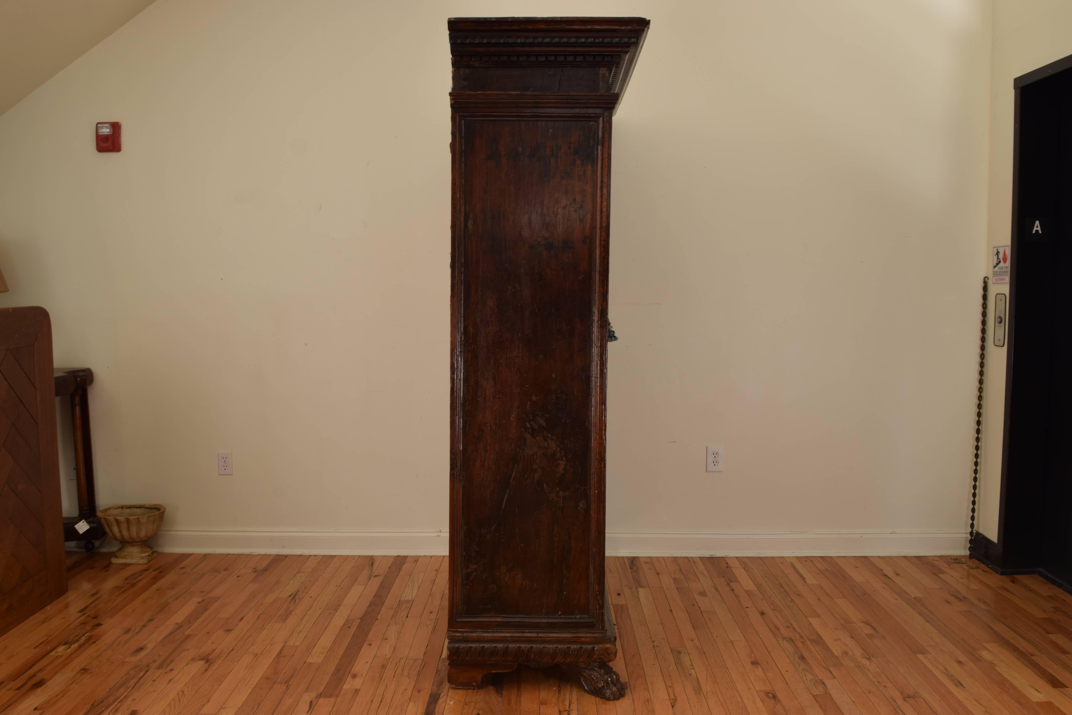 Italian, Tuscany, Carved and Paneled Walnut Armadio, Baroque, 17th Century In Excellent Condition In Atlanta, GA