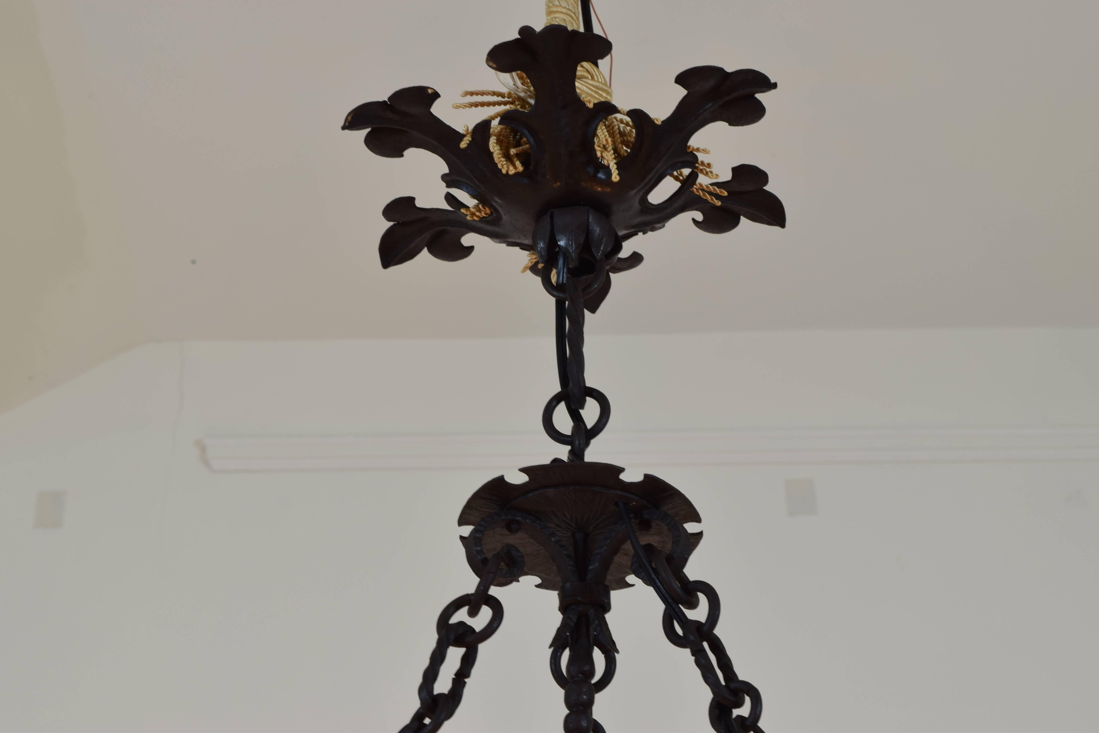 Milanese Masterfully Wrought Iron Seven-Light Chandelier, Early 20th Century In Excellent Condition In Atlanta, GA