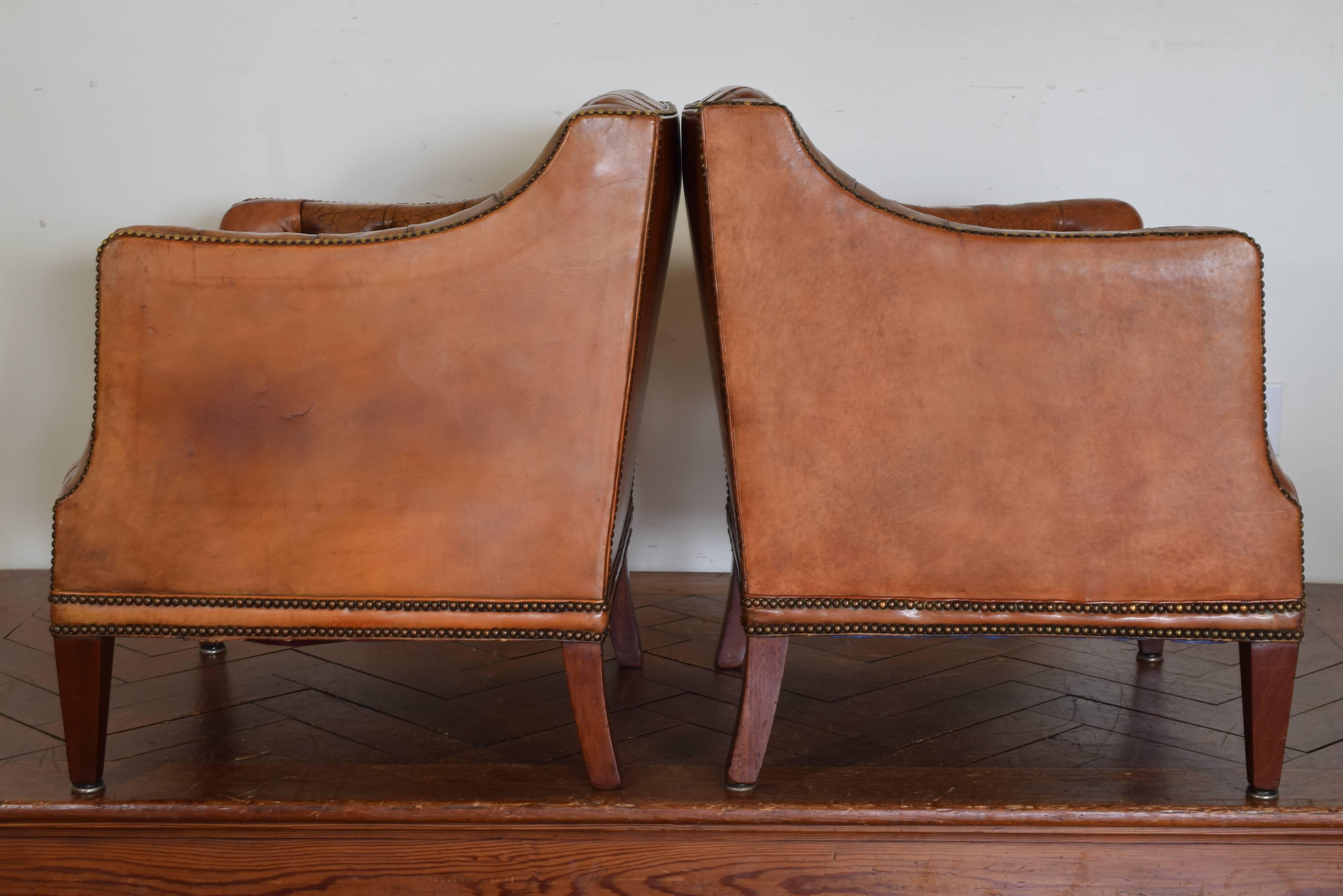 Regency Pair of French Mahogany and Tufted Leather Upholstered Bergeres