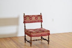 French Louis XIV Style Walnut and Upholstered Fireside Chair, mid 19th century