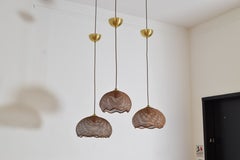 Set of Three English Woven Rattan Pendant Lights, 20th C.
