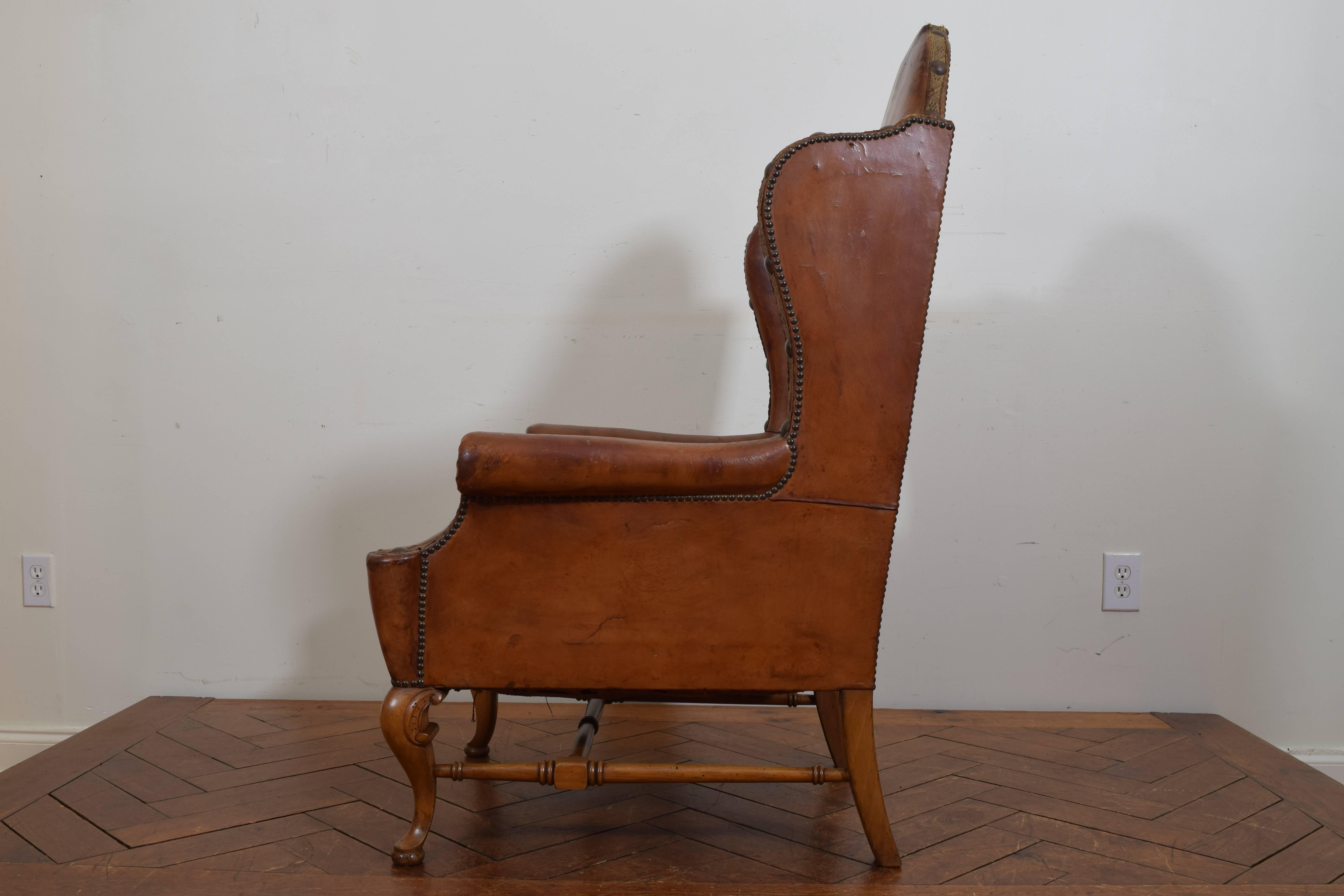 Spanish Baroque Style Walnut and Leather Upholstered Wing Chair, 19th Century In Good Condition In Atlanta, GA