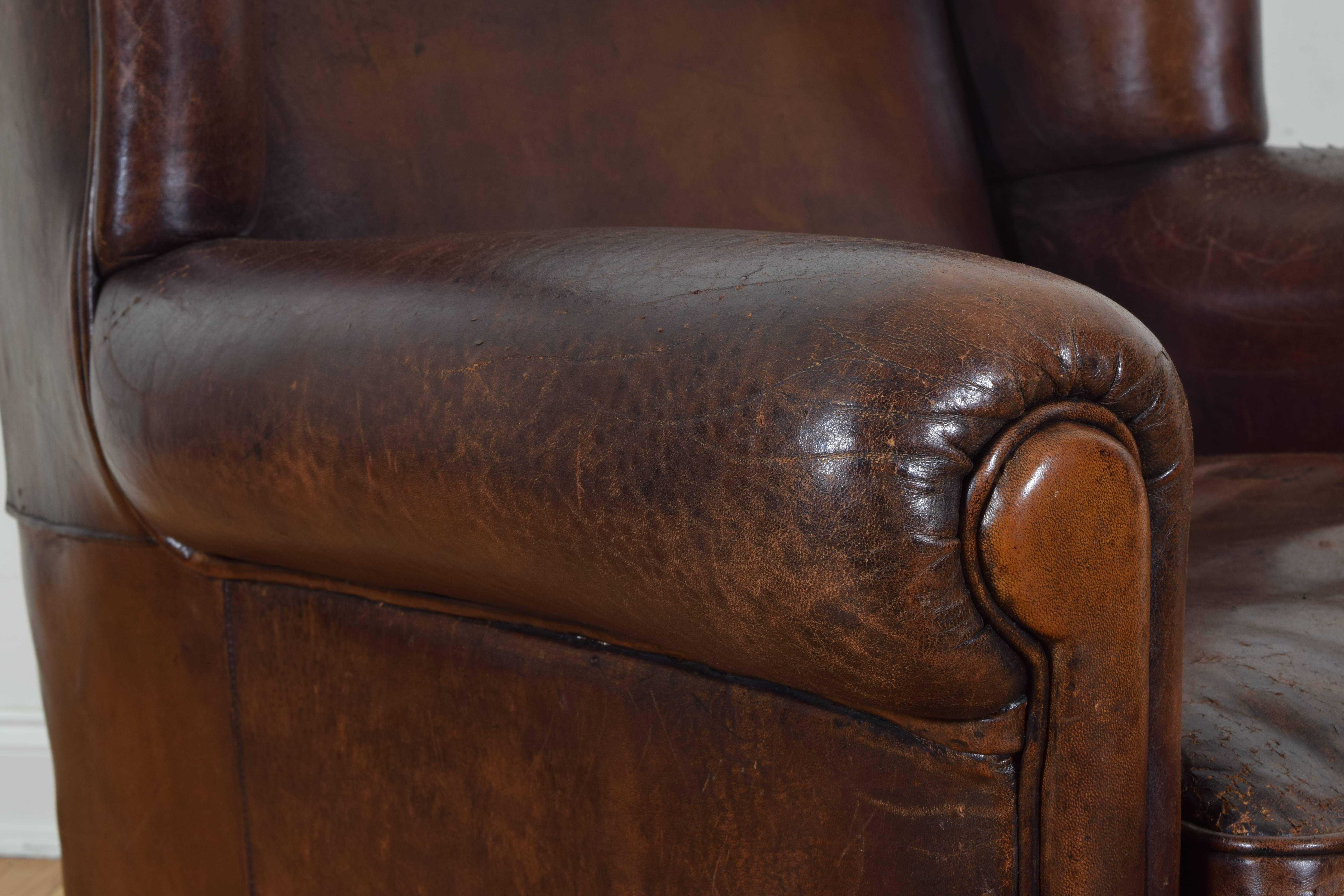 Pair of English Leather Upholstered Wingchairs with Piping, circa 1940s 4