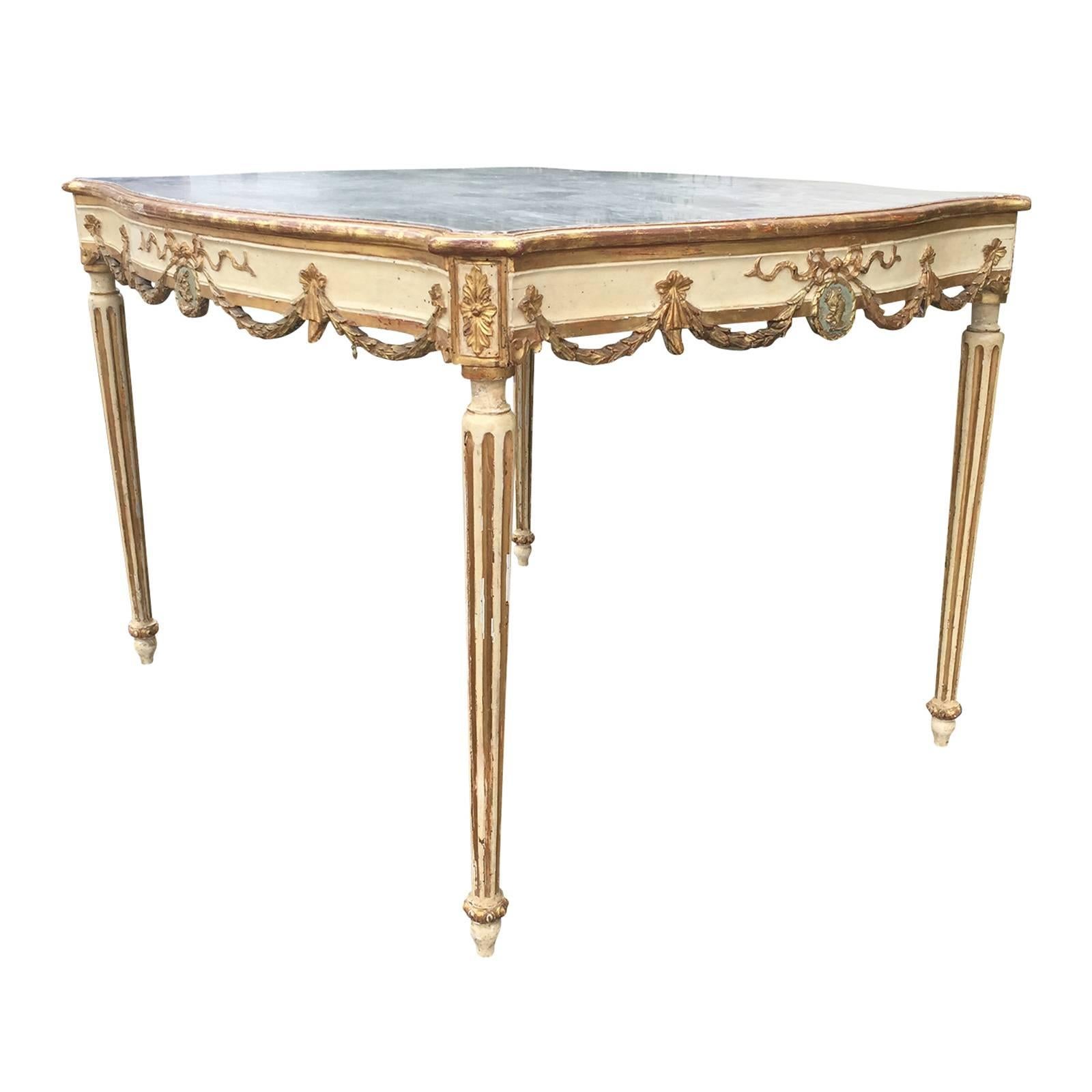 18th or 19th century Italian centre table with garland.
