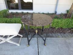 PAIR OF 20thC IRON & BRONZE GUERIDON TABLES WITH STONE TOPS