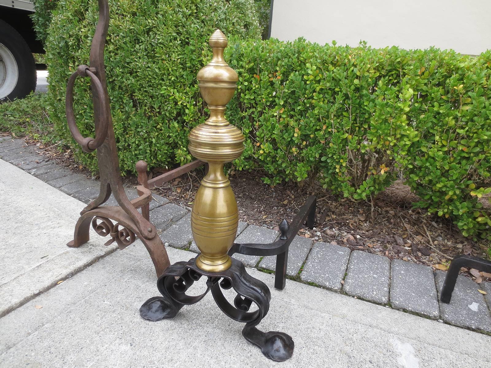 Pair of late 19th-early 20th century English bronze and iron andirons.