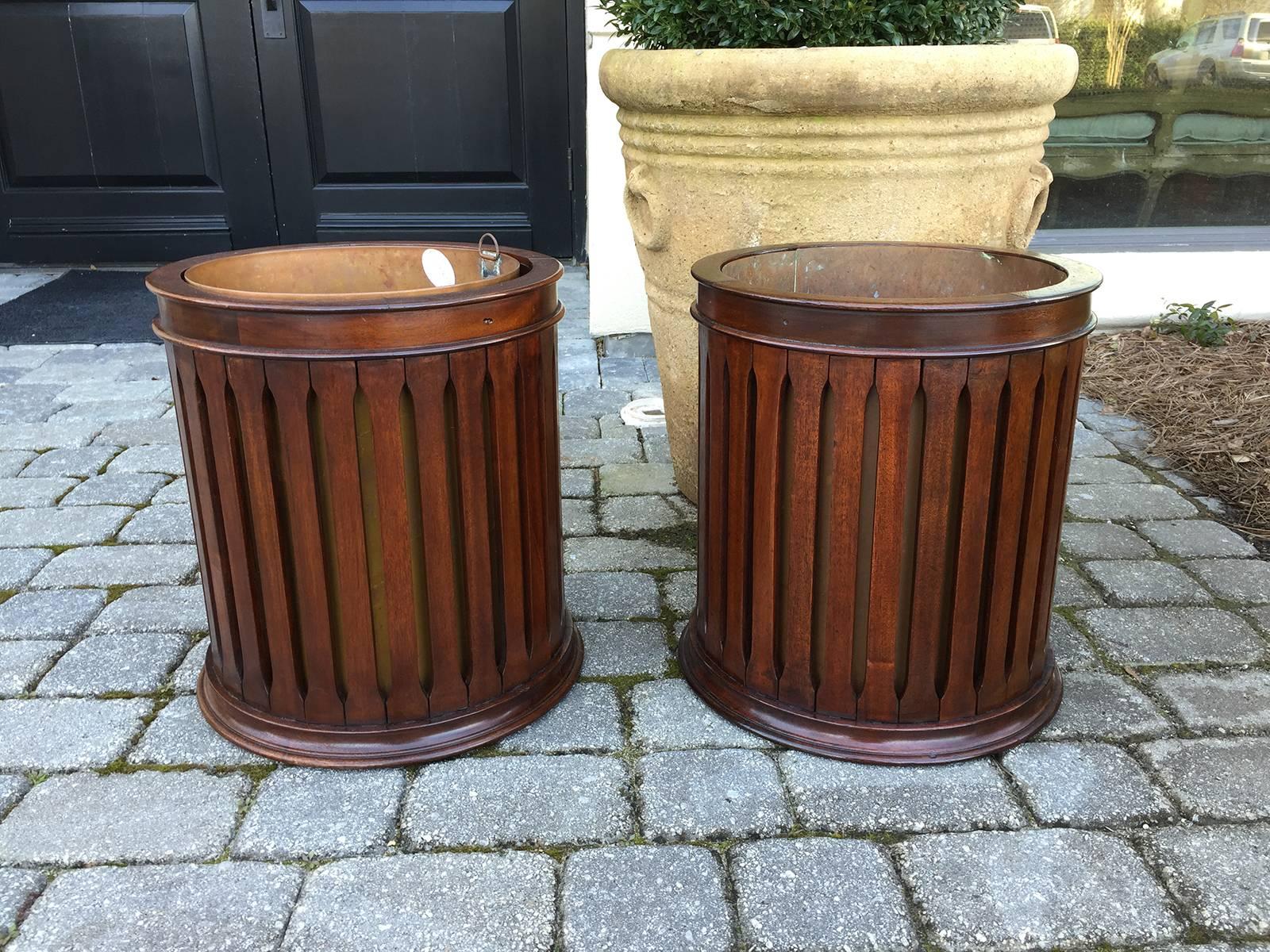 Pair of 19th century copper lined English mahogany buckets in the style of George III.