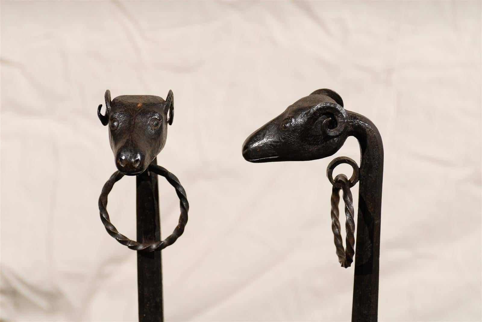 Pair of Giacometti Style 19th Century Cast Iron Rams Head Iron Andirons In Good Condition For Sale In Atlanta, GA