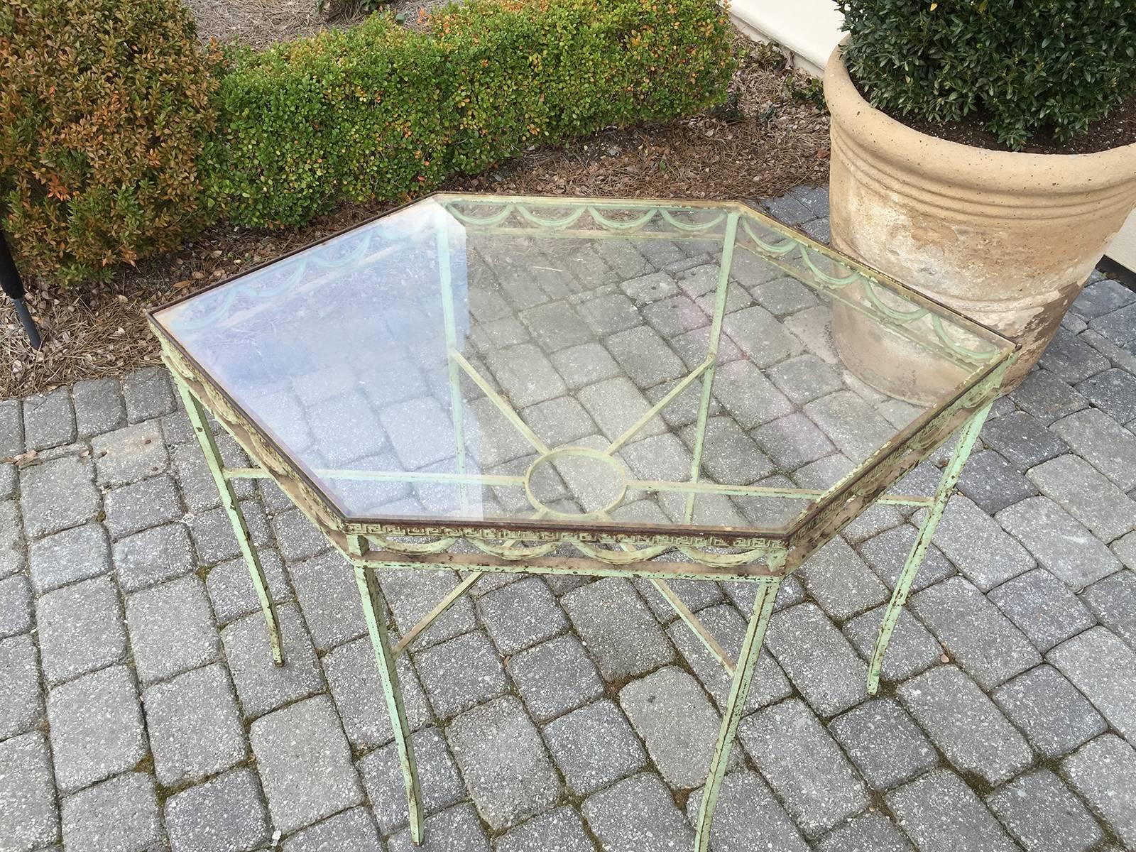 Quality octagonal iron garden table, probably Salterini.