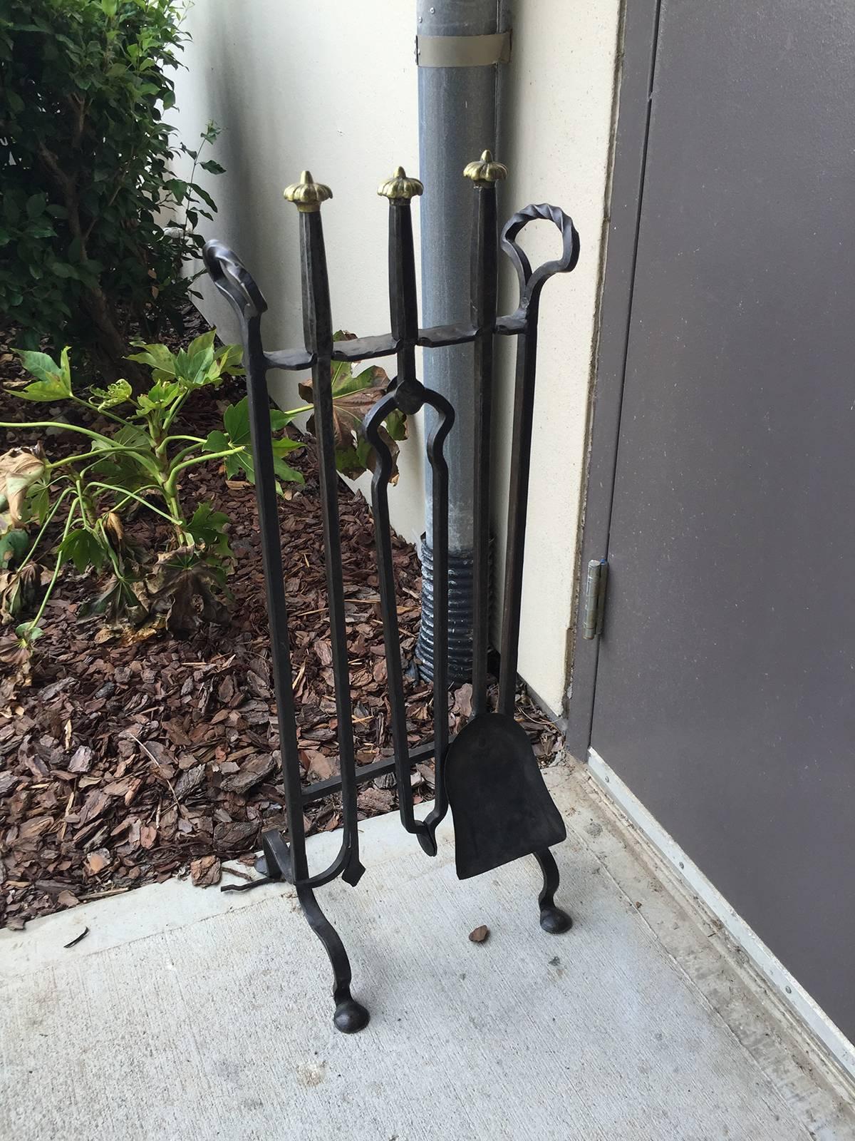 Early 20th century brass and iron fire tool stand.