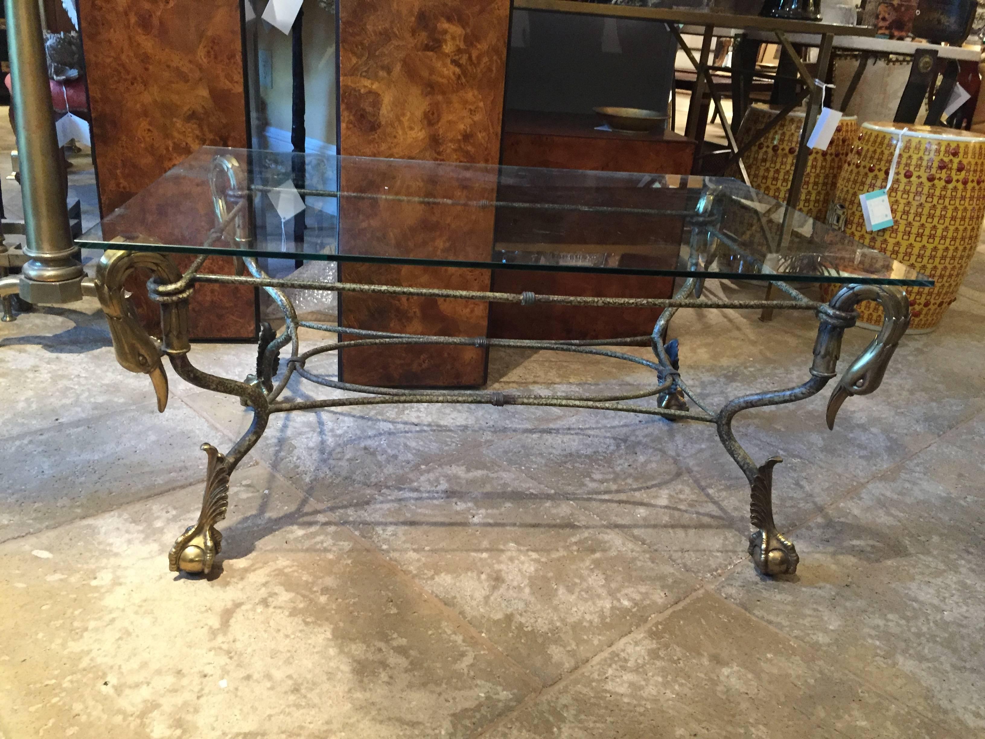 20th century swan head coffee table with glass top, brass and steel.