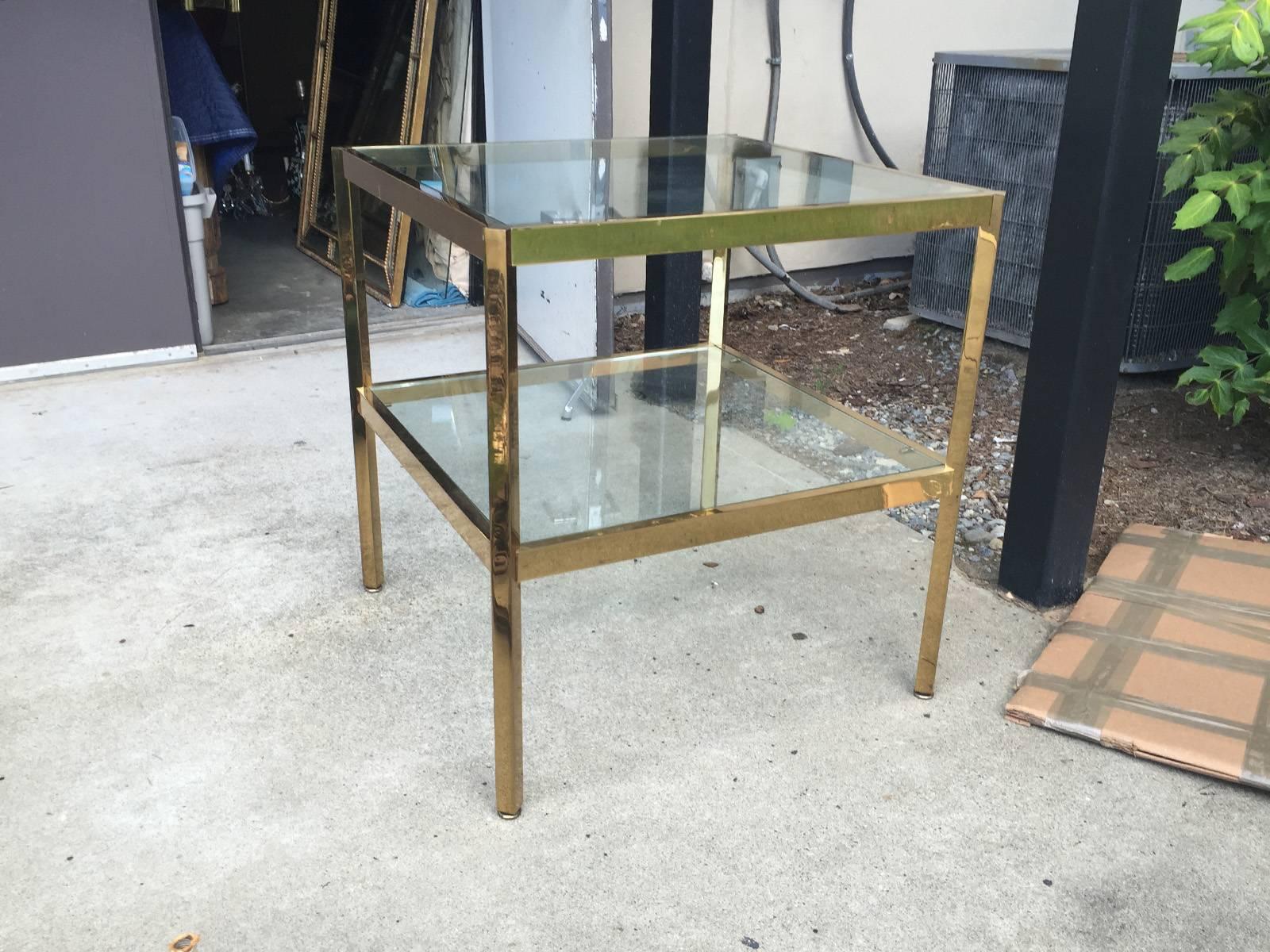 Mid-Century two-tier brass and glass table.