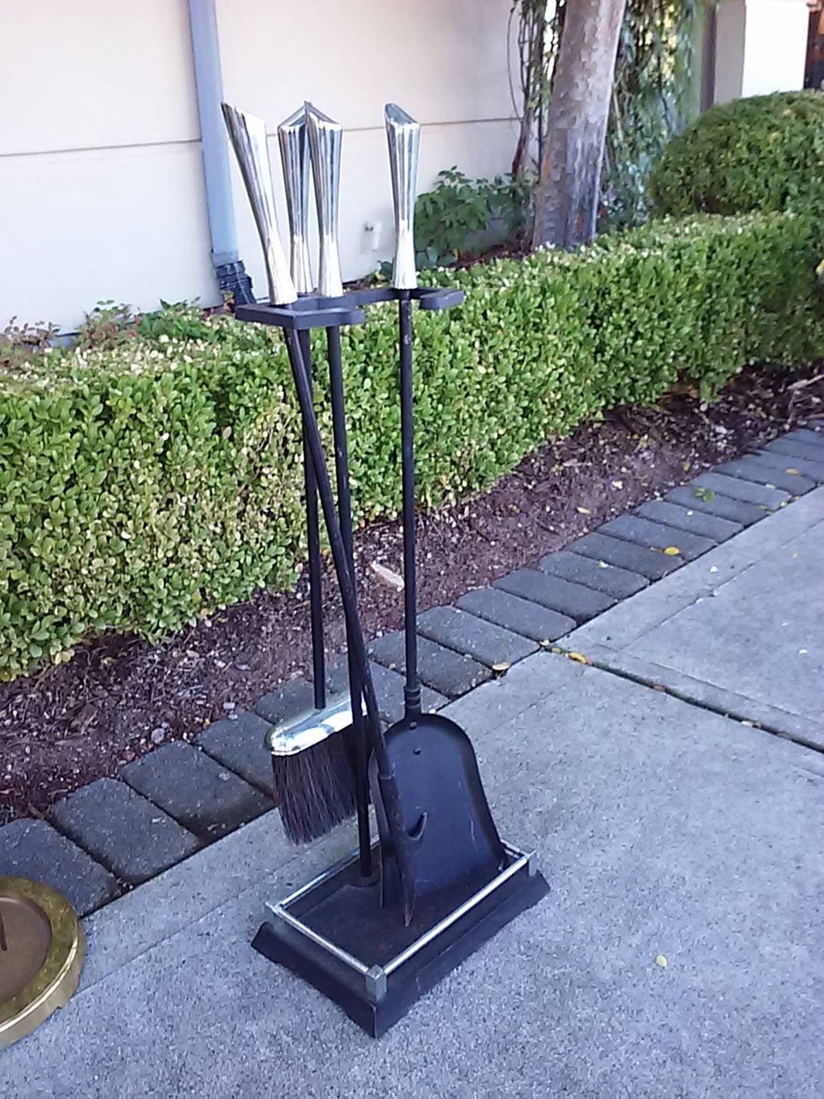 Mid-Century chrome fire tools on stand.