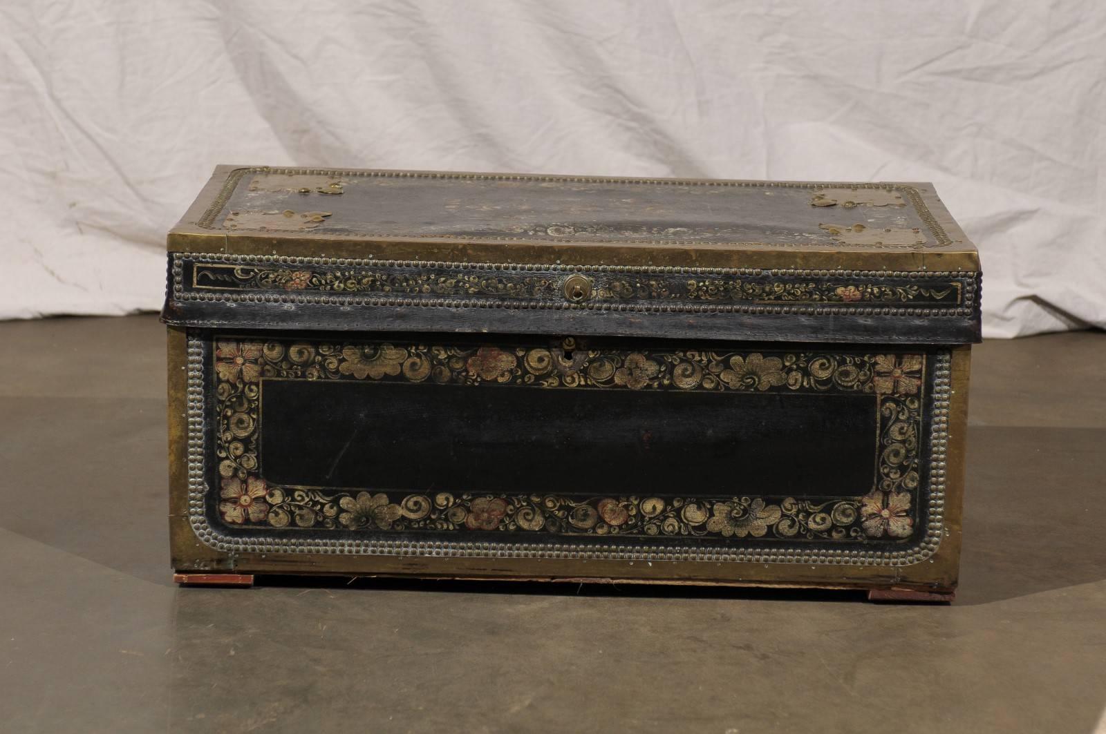 19th century leather and brass trunk.