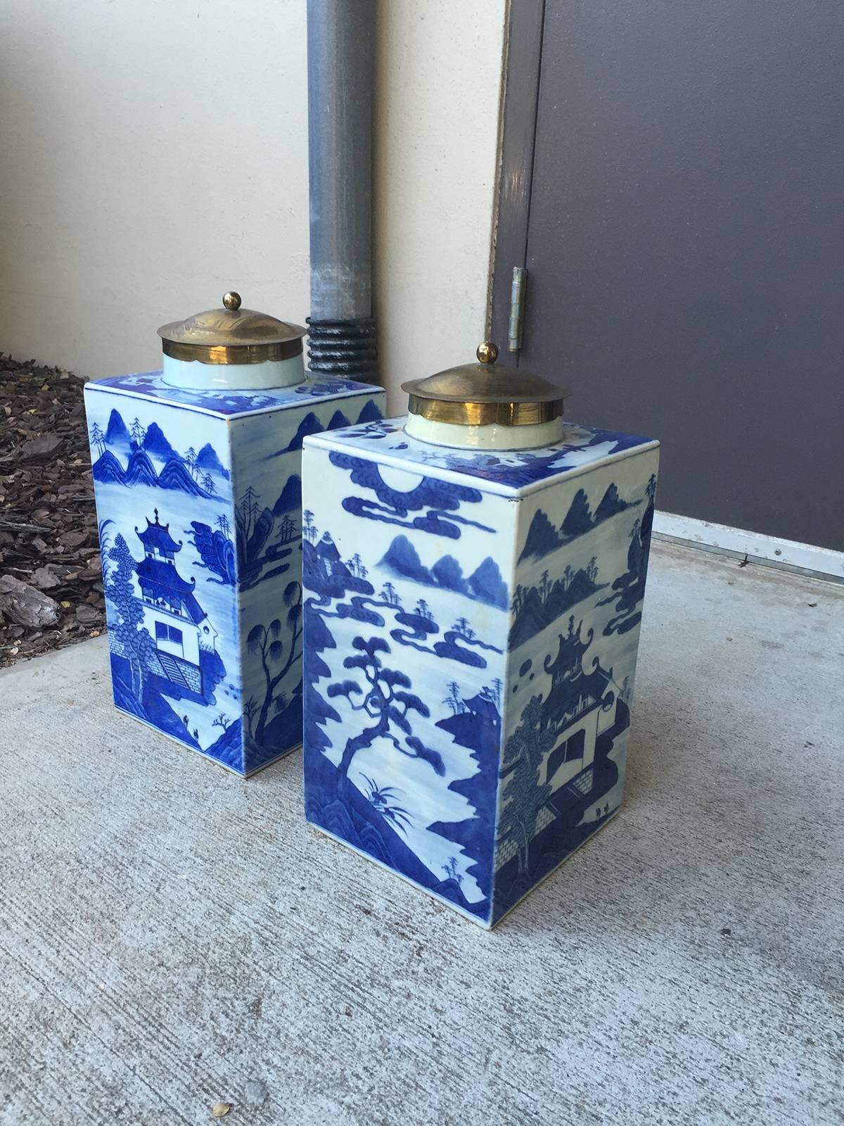19th century pair of chinese blue and white tea canisters.
