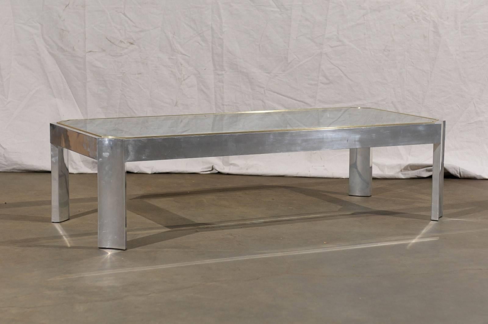 Aluminium and brass coffee table In the style of Ron Selfe, circa 1970.
