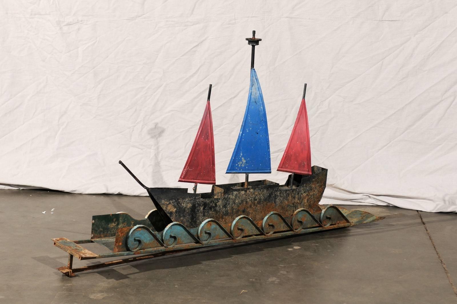 Early 20th century American folk art ship with waves sculpture.