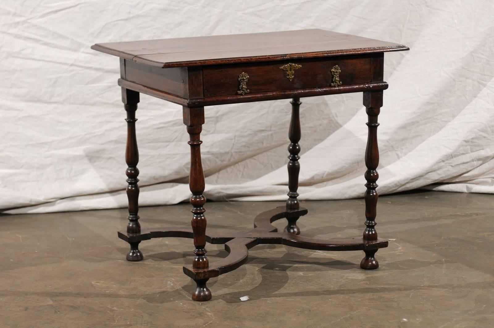 18th-19th century William and Mary oak one drawer table with stretcher.