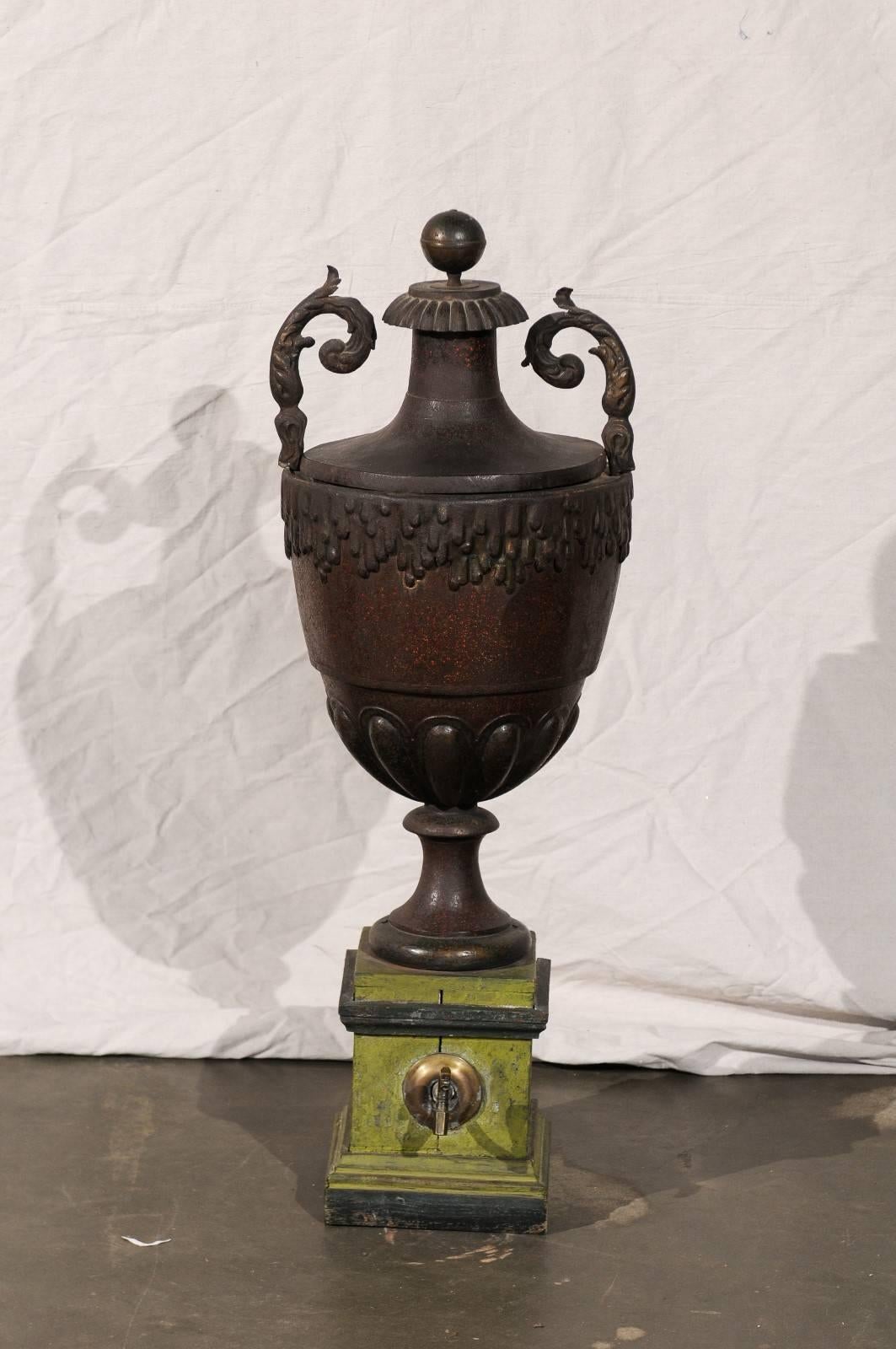 Early 19th century probably French tole fountain with finial and faux, porphry finish